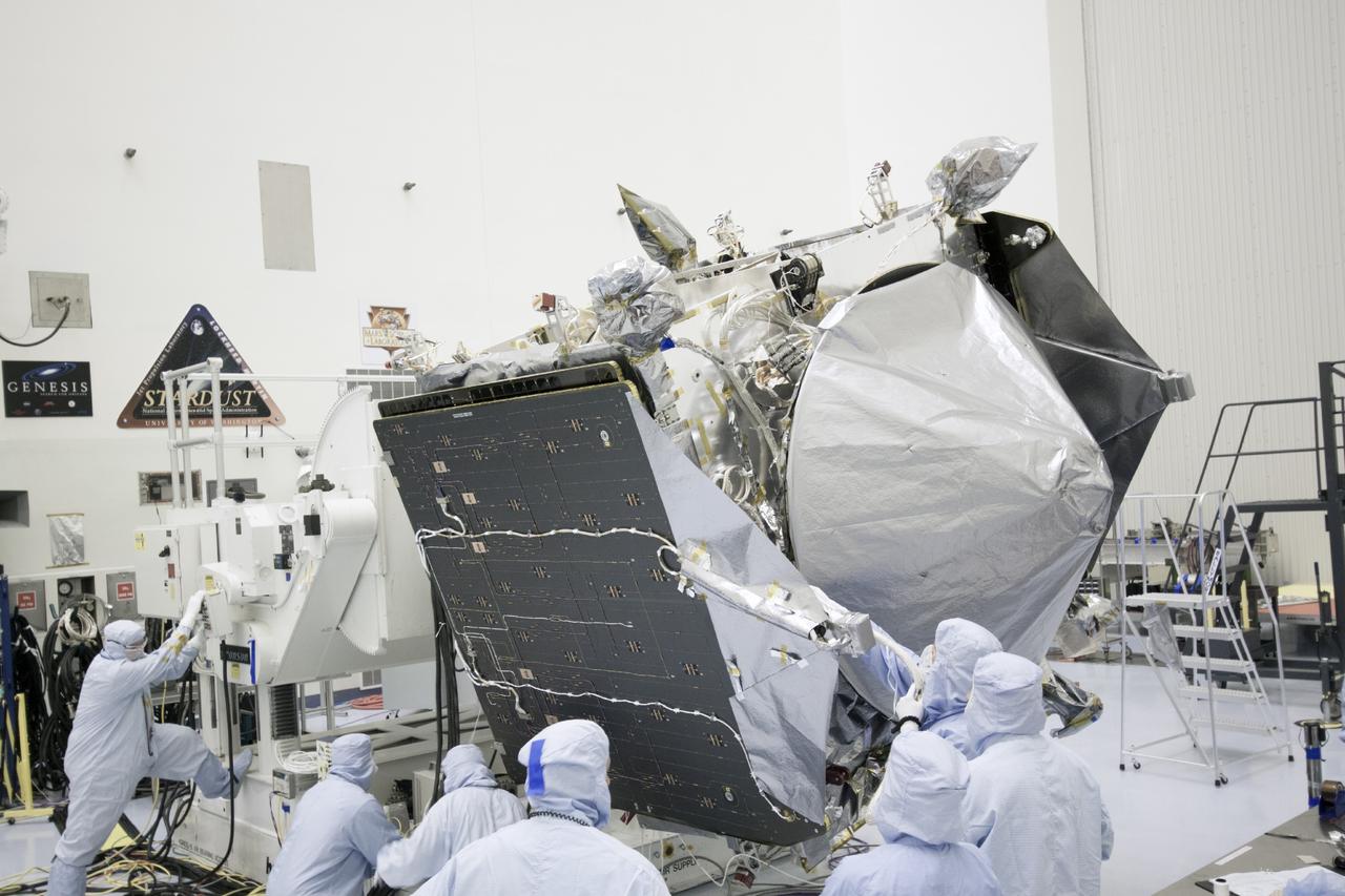 CAPE CANAVERAL, Fla. – Inside the Payload Hazardous Servicing Facility at NASA's Kennedy Space Center in Florida, engineers and technicians test close the twin solar arrays on the Mars Atmosphere and Volatile Evolution, or MAVEN, spacecraft.      MAVEN is being prepared for its scheduled launch in November from Cape Canaveral Air Force Station, Fla. atop a United Launch Alliance Atlas V rocket. Positioned in an orbit above the Red Planet, MAVEN will study the upper atmosphere of Mars in unprecedented detail. For more information, visit: http://www.nasa.gov/mission_pages/maven/main/index.html Photo credit: NASA/Jim Grossmann