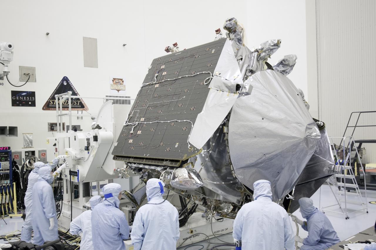 CAPE CANAVERAL, Fla. – Inside the Payload Hazardous Servicing Facility at NASA's Kennedy Space Center in Florida, engineers and technicians test close the twin solar arrays on the Mars Atmosphere and Volatile Evolution, or MAVEN, spacecraft.      MAVEN is being prepared for its scheduled launch in November from Cape Canaveral Air Force Station, Fla. atop a United Launch Alliance Atlas V rocket. Positioned in an orbit above the Red Planet, MAVEN will study the upper atmosphere of Mars in unprecedented detail. For more information, visit: http://www.nasa.gov/mission_pages/maven/main/index.html Photo credit: NASA/Jim Grossmann