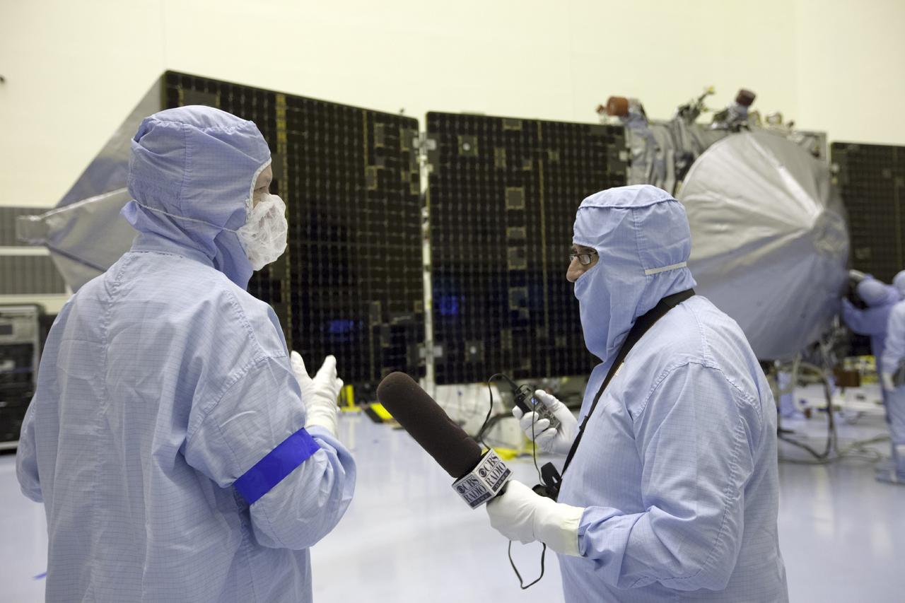 CAPE CANAVERAL, Fla. – Inside the Payload Hazardous Servicing Facility at NASA's Kennedy Space Center in Florida, reporters and photographers look over the Mars Atmosphere and Volatile Evolution, or MAVEN, spacecraft. Members of the news media were given an opportunity to view MAVEN and interview program officials. MAVEN is being prepared for its scheduled launch in November from Cape Canaveral Air Force Station, Fla. atop a United Launch Alliance Atlas V rocket. Positioned in an orbit above the Red Planet, MAVEN will study the upper atmosphere of Mars in unprecedented detail. For more information, visit: http://www.nasa.gov/mission_pages/maven/main/index.html Photo credit: NASA/Kim Shiflett