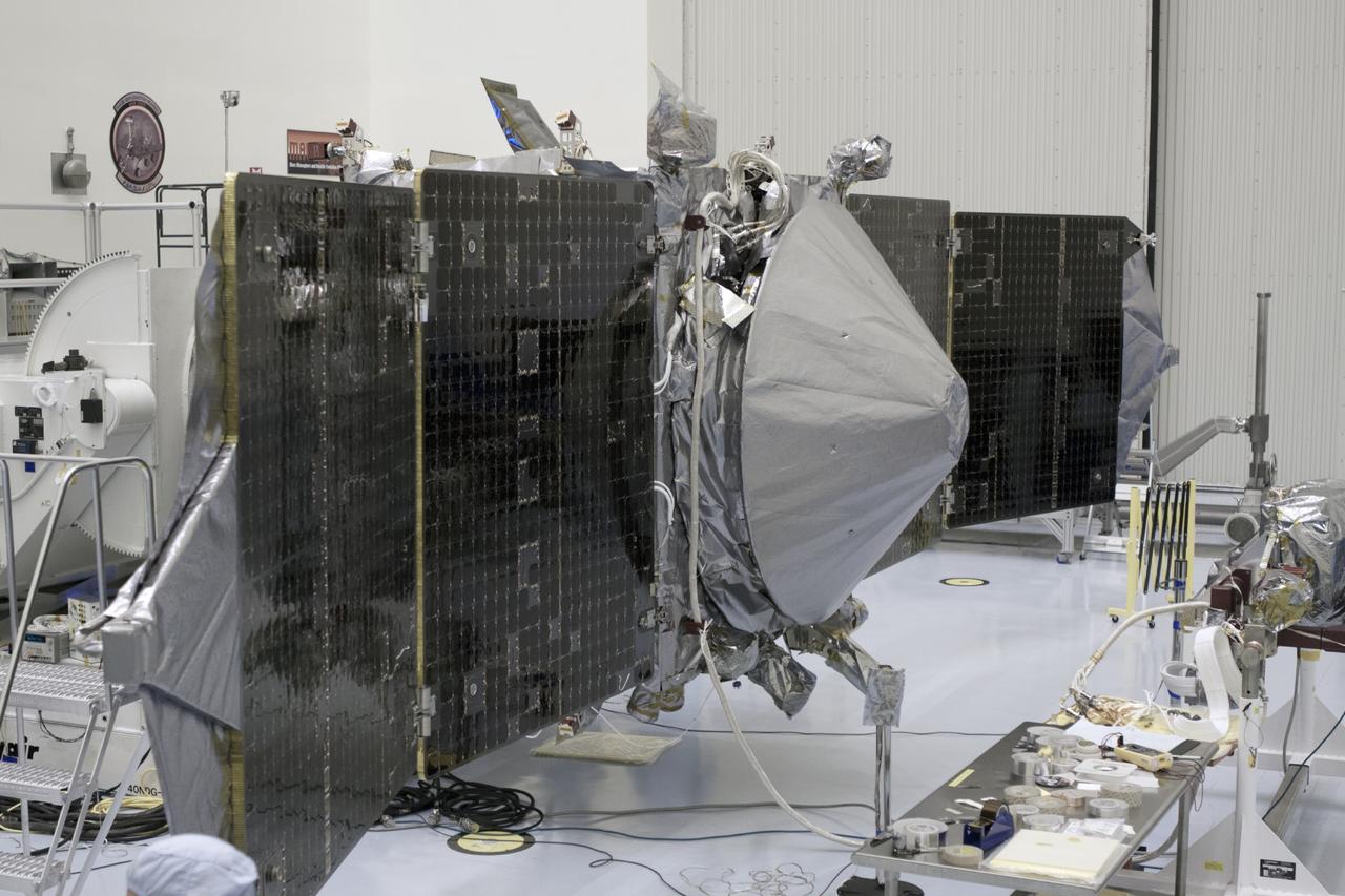 CAPE CANAVERAL, Fla. – Inside the Payload Hazardous Servicing Facility at NASA's Kennedy Space Center in Florida, engineers and technicians have begun the process to stow the power-generating solar arrays for the Mars Atmosphere and Volatile Evolution, or MAVEN, spacecraft. MAVEN is being prepared for its scheduled launch on Nov 18, 2013 from Cape Canaveral Air Force Station, Fla. atop a United Launch Alliance Atlas V rocket. Positioned in an orbit above the Red Planet, MAVEN will study the upper atmosphere of Mars in unprecedented detail. For more information, visit: http://www.nasa.gov/mission_pages/maven/main/index.html Photo credit: NASA/Jim Grossmann