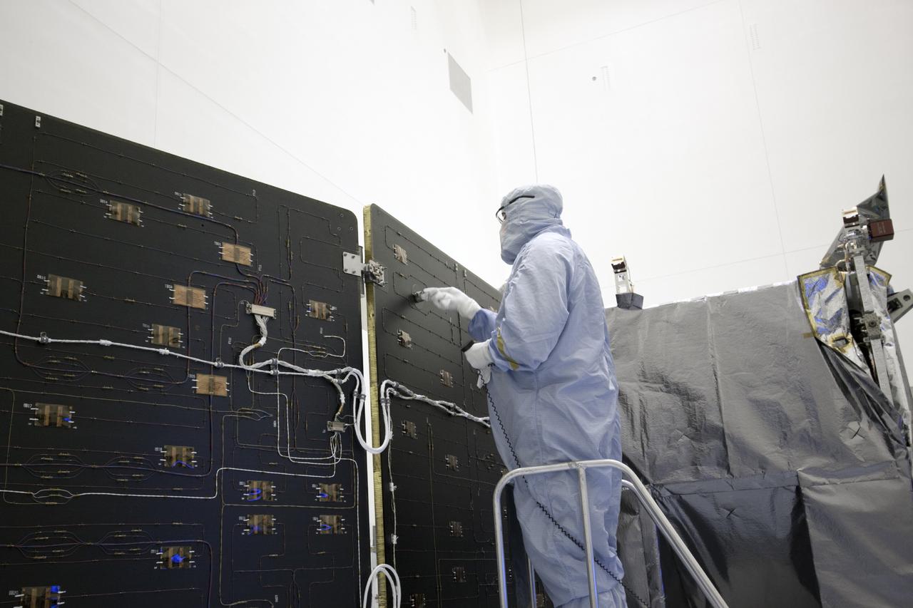 CAPE CANAVERAL, Fla. – Inside the Payload Hazardous Servicing Facility at NASA's Kennedy Space Center in Florida, the solar arrays are being checked out prior to beginning process of stowing the power-generating panels on the Mars Atmosphere and Volatile Evolution, or MAVEN, spacecraft. MAVEN is being prepared for its scheduled launch on Nov 18, 2013 from Cape Canaveral Air Force Station, Fla. atop a United Launch Alliance Atlas V rocket. Positioned in an orbit above the Red Planet, MAVEN will study the upper atmosphere of Mars in unprecedented detail. For more information, visit: http://www.nasa.gov/mission_pages/maven/main/index.html Photo credit: NASA/Jim Grossmann