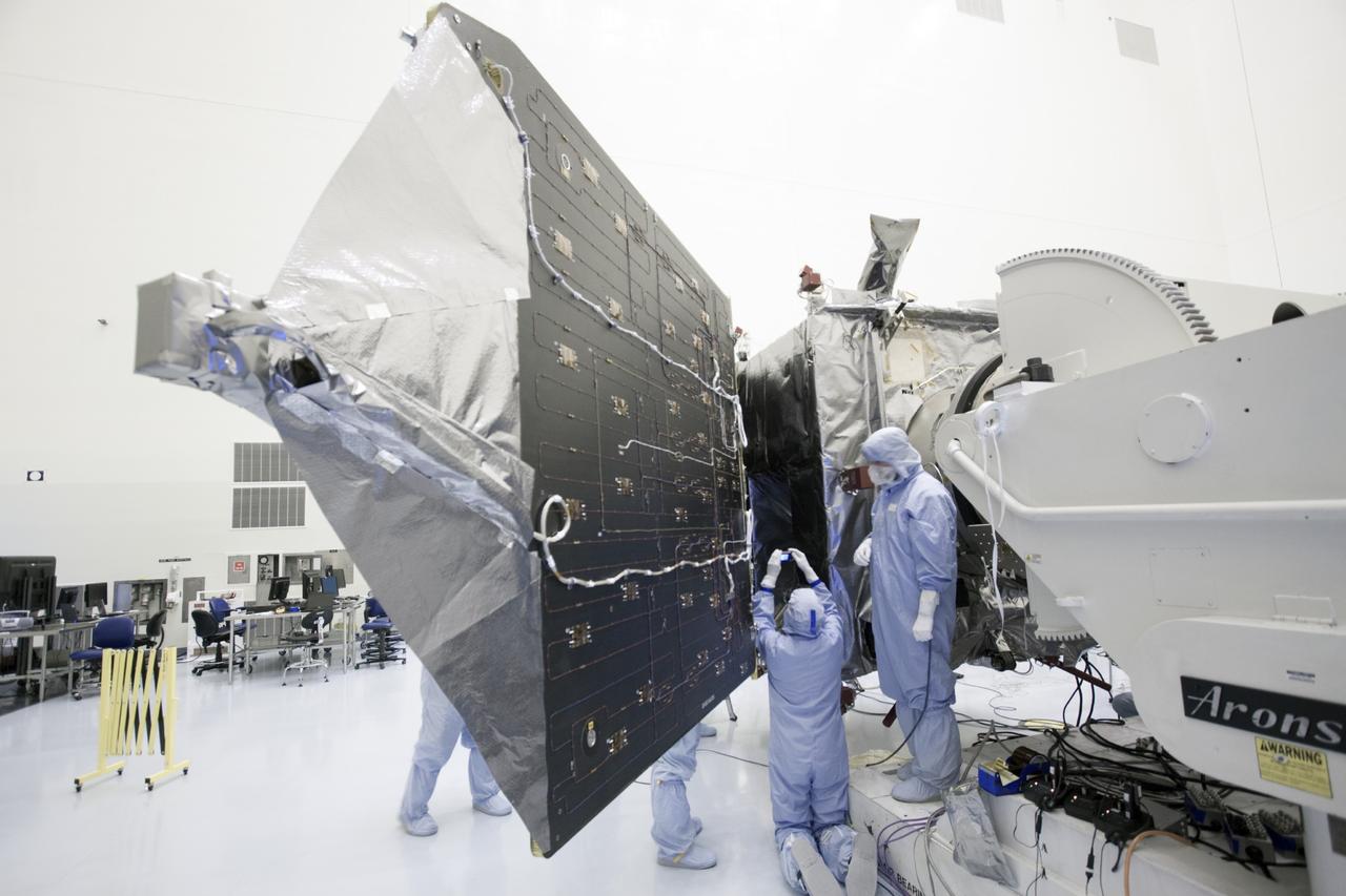 CAPE CANAVERAL, Fla. – Inside the Payload Hazardous Servicing Facility at NASA's Kennedy Space Center in Florida, engineers and technicians have begun the process to stow the power-generating solar arrays for the Mars Atmosphere and Volatile Evolution, or MAVEN, spacecraft. MAVEN is being prepared for its scheduled launch on Nov 18, 2013 from Cape Canaveral Air Force Station, Fla. atop a United Launch Alliance Atlas V rocket. Positioned in an orbit above the Red Planet, MAVEN will study the upper atmosphere of Mars in unprecedented detail. For more information, visit: http://www.nasa.gov/mission_pages/maven/main/index.html Photo credit: NASA/Jim Grossmann