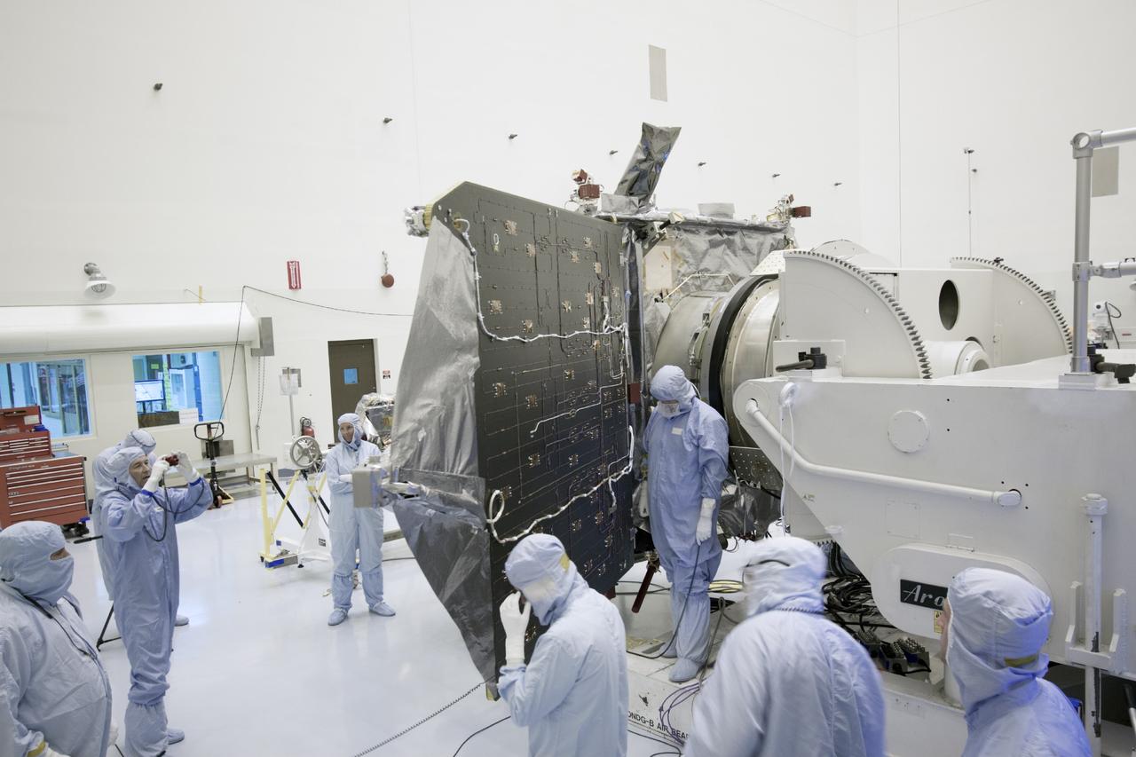 CAPE CANAVERAL, Fla. – Inside the Payload Hazardous Servicing Facility at NASA's Kennedy Space Center in Florida, engineers and technicians have begun the process to stow the power-generating solar arrays for the Mars Atmosphere and Volatile Evolution, or MAVEN, spacecraft. MAVEN is being prepared for its scheduled launch on Nov 18, 2013 from Cape Canaveral Air Force Station, Fla. atop a United Launch Alliance Atlas V rocket. Positioned in an orbit above the Red Planet, MAVEN will study the upper atmosphere of Mars in unprecedented detail. For more information, visit: http://www.nasa.gov/mission_pages/maven/main/index.html Photo credit: NASA/Jim Grossmann