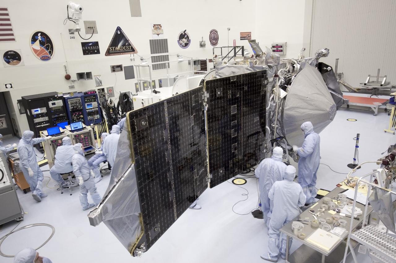 CAPE CANAVERAL, Fla. – Inside the Payload Hazardous Servicing Facility at NASA's Kennedy Space Center in Florida, engineers and technicians have begun the process to stow the power-generating solar arrays for the Mars Atmosphere and Volatile Evolution, or MAVEN, spacecraft.      MAVEN is being prepared for its scheduled launch on Nov 18, 2013 from Cape Canaveral Air Force Station, Fla. atop a United Launch Alliance Atlas V rocket. Positioned in an orbit above the Red Planet, MAVEN will study the upper atmosphere of Mars in unprecedented detail. For more information, visit: http://www.nasa.gov/mission_pages/maven/main/index.html Photo credit: NASA/Jim Grossmann