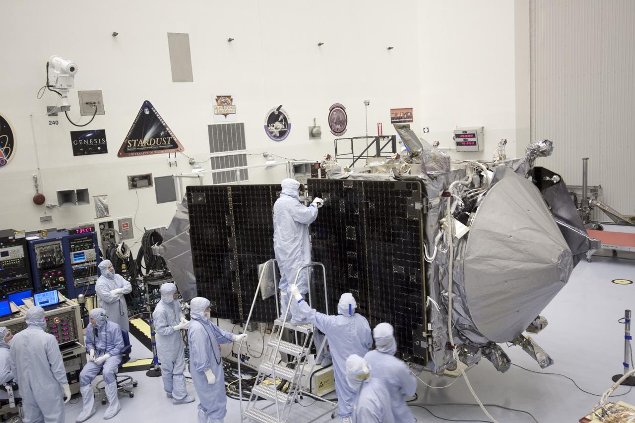 CAPE CANAVERAL, Fla. – Inside the Payload Hazardous Servicing Facility at NASA's Kennedy Space Center in Florida, engineers and technicians have begun the process to stow the power-generating solar arrays for the Mars Atmosphere and Volatile Evolution, or MAVEN, spacecraft. MAVEN is being prepared for its scheduled launch on Nov 18, 2013 from Cape Canaveral Air Force Station, Fla. atop a United Launch Alliance Atlas V rocket. Positioned in an orbit above the Red Planet, MAVEN will study the upper atmosphere of Mars in unprecedented detail. For more information, visit: http://www.nasa.gov/mission_pages/maven/main/index.html Photo credit: NASA/Jim Grossmann
