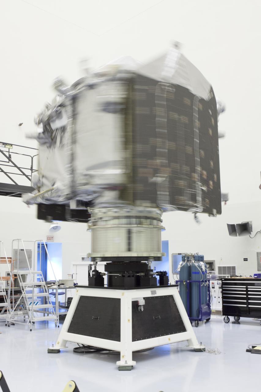 CAPE CANAVERAL, Fla. – Inside the Payload Hazardous Servicing Facility at NASA's Kennedy Space Center in Florida, engineers and technicians perform a spin test of the Mars Atmosphere and Volatile Evolution, or MAVEN, spacecraft. The operation is designed to verify that MAVEN is properly balanced as it spins during the initial mission activities.      MAVEN is being prepared for its scheduled launch on Nov 18, 2013 from Cape Canaveral Air Force Station, Fla. atop a United Launch Alliance Atlas V rocket. Positioned in an orbit above the Red Planet, MAVEN will study the upper atmosphere of Mars in unprecedented detail. For more information, visit: http://www.nasa.gov/mission_pages/maven/main/index.html Photo credit: NASA/Kim Shiflett