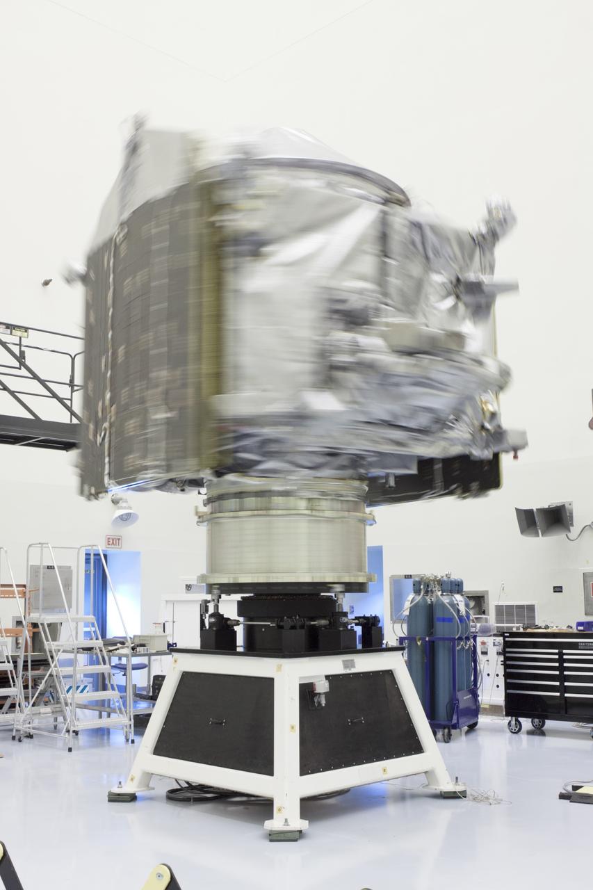 CAPE CANAVERAL, Fla. – Inside the Payload Hazardous Servicing Facility at NASA's Kennedy Space Center in Florida, engineers and technicians perform a spin test of the Mars Atmosphere and Volatile Evolution, or MAVEN, spacecraft. The operation is designed to verify that MAVEN is properly balanced as it spins during the initial mission activities.      MAVEN is being prepared for its scheduled launch on Nov 18, 2013 from Cape Canaveral Air Force Station, Fla. atop a United Launch Alliance Atlas V rocket. Positioned in an orbit above the Red Planet, MAVEN will study the upper atmosphere of Mars in unprecedented detail. For more information, visit: http://www.nasa.gov/mission_pages/maven/main/index.html Photo credit: NASA/Kim Shiflett