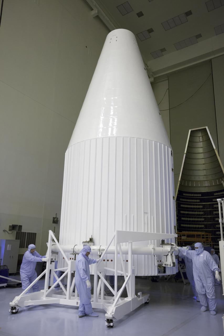 CAPE CANAVERAL, Fla. – The payload fairing for the Mars Atmosphere and Volatile Evolution, or MAVEN, spacecraft arrives at the Payload Hazardous Servicing Facility at NASA's Kennedy Space Center in Florida.    MAVEN is being prepared for its scheduled launch on Nov 18, 2013 from Cape Canaveral Air Force Station, Fla. atop a United Launch Alliance Atlas V rocket. Positioned in an orbit above the Red Planet, MAVEN will study the upper atmosphere of Mars in unprecedented detail. For more information, visit: http://www.nasa.gov/mission_pages/maven/main/index.html Photo credit: NASA/Kim Shiflett