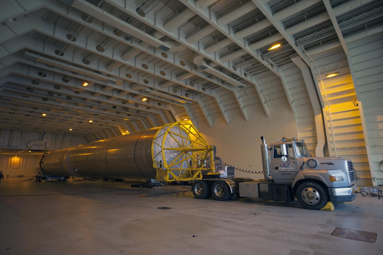 PORT CANAVERAL, Fla. – The United Launch Alliance barge Delta Mariner arrives at Port Canaveral, Fla. delivering the Atlas V launch vehicle that will boost the Tracking and Data Relay Satellite, or TDRS-L, spacecraft into orbit around the Earth. The rocket's first-stage booster and Centaur upper stage will be transported to the hangar at the Atlas Spaceflight Operations Center on Cape Canaveral Air Force Station for checkout in preparation for launch.      TDRS-L is the second of three next-generation satellites designed to ensure vital operational continuity for the NASA Space Network. It is scheduled to launch from Cape Canaveral's Space Launch Complex 41 atop an Atlas V rocket in January 2014. The current Tracking and Data Relay Satellite system consists of eight in-orbit satellites distributed to provide near continuous information relay service to missions such as the Hubble Space Telescope and International Space Station. For more information, visit: http://www.nasa.gov/content/tracking-and-data-relay-satellite-tdrs/ Photo credit: NASA/ Kim Shiflett