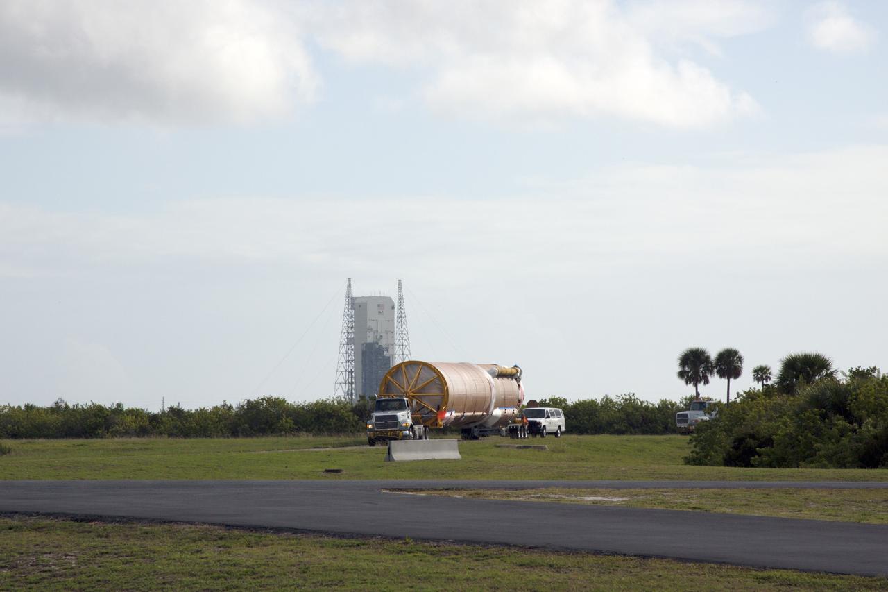 CAPE CANAVERAL, Fla. – The United Launch Alliance Atlas V launch vehicle that will boost the Tracking and Data Relay Satellite, or TDRS-L, spacecraft into orbit is being transported to the hangar at the Atlas Spaceflight Operations Center on Cape Canaveral Air Force Station for checkout in preparation for launch. TDRS-L is the second of three next-generation satellites designed to ensure vital operational continuity for the NASA Space Network. It is scheduled to launch from Cape Canaveral's Space Launch Complex 41 atop an Atlas V rocket in January 2014. The current Tracking and Data Relay Satellite system consists of eight in-orbit satellites distributed to provide near continuous information relay service to missions such as the Hubble Space Telescope and International Space Station. For more information, visit: http://www.nasa.gov/content/tracking-and-data-relay-satellite-tdrs/ Photo credit: NASA/ Jim Grossman
