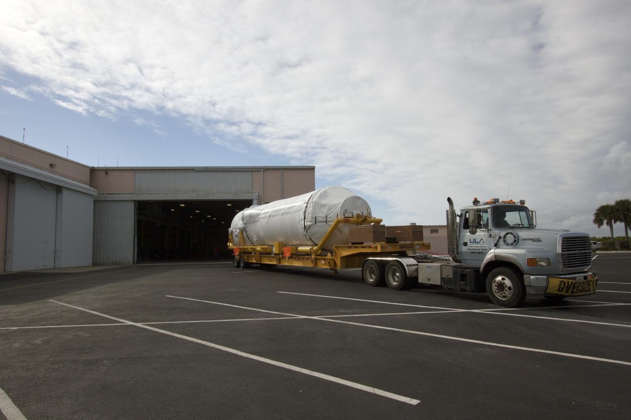 CAPE CANAVERAL, Fla. – The United Launch Alliance Centaur upper stage that will boost the Tracking and Data Relay Satellite, or TDRS-L, spacecraft into orbit arrives at the Atlas Spaceflight Operations Center on Cape Canaveral Air Force Station for checkout in preparation for launch. TDRS-L is the second of three next-generation satellites designed to ensure vital operational continuity for the NASA Space Network. It is scheduled to launch from Cape Canaveral's Space Launch Complex 41 atop an Atlas V rocket in January 2014. The current Tracking and Data Relay Satellite system consists of eight in-orbit satellites distributed to provide near continuous information relay service to missions such as the Hubble Space Telescope and International Space Station. For more information, visit: http://www.nasa.gov/content/tracking-and-data-relay-satellite-tdrs/ Photo credit: NASA/ Jim Grossman