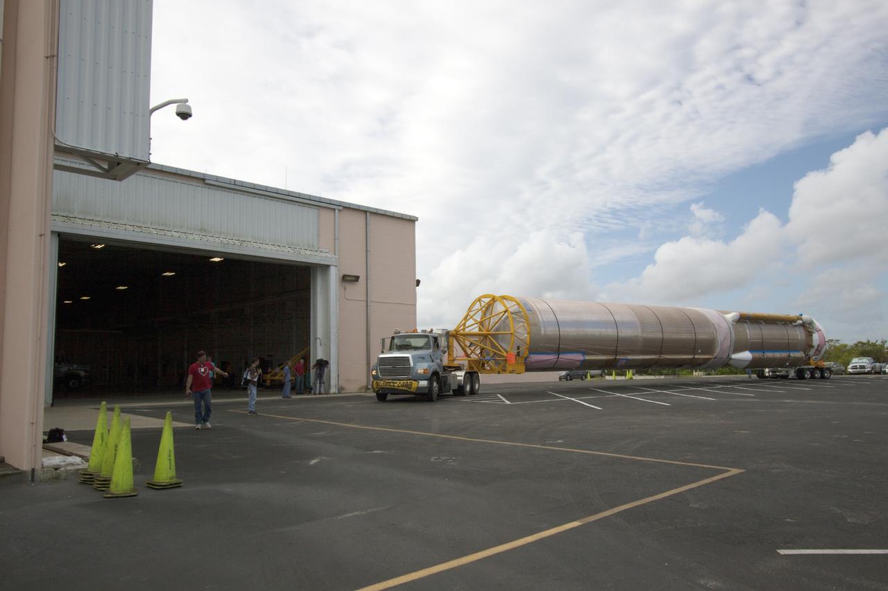 CAPE CANAVERAL, Fla. – The United Launch Alliance Atlas V launch vehicle that will boost the Tracking and Data Relay Satellite, or TDRS-L, spacecraft into orbit arrives at the Atlas Spaceflight Operations Center on Cape Canaveral Air Force Station for checkout in preparation for launch. TDRS-L is the second of three next-generation satellites designed to ensure vital operational continuity for the NASA Space Network. It is scheduled to launch from Cape Canaveral's Space Launch Complex 41 atop an Atlas V rocket in January 2014. The current Tracking and Data Relay Satellite system consists of eight in-orbit satellites distributed to provide near continuous information relay service to missions such as the Hubble Space Telescope and International Space Station. For more information, visit: http://www.nasa.gov/content/tracking-and-data-relay-satellite-tdrs/ Photo credit: NASA/ Jim Grossman