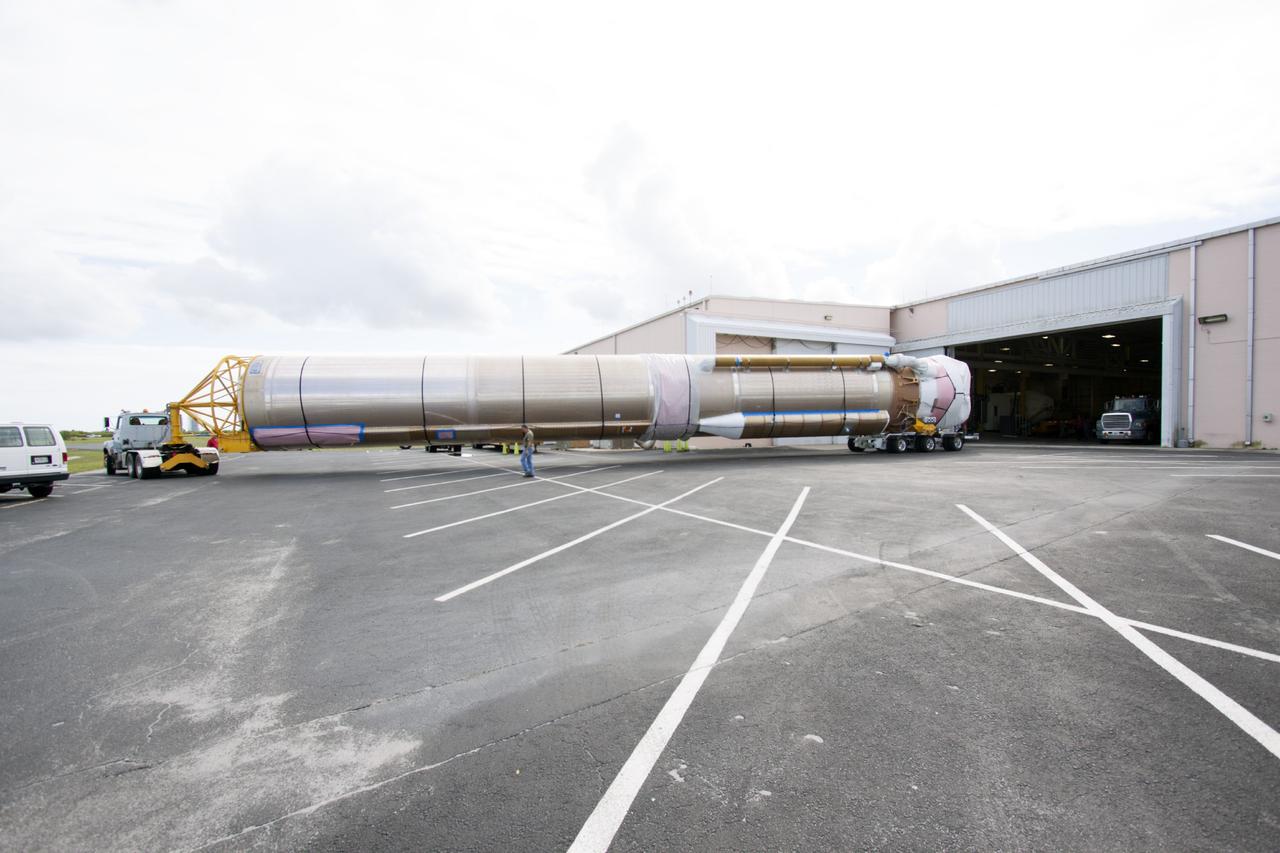 CAPE CANAVERAL, Fla. – The United Launch Alliance Atlas V launch vehicle that will boost the Tracking and Data Relay Satellite, or TDRS-L, spacecraft into orbit arrives at the Atlas Spaceflight Operations Center on Cape Canaveral Air Force Station for checkout in preparation for launch. TDRS-L is the second of three next-generation satellites designed to ensure vital operational continuity for the NASA Space Network. It is scheduled to launch from Cape Canaveral's Space Launch Complex 41 atop an Atlas V rocket in January 2014. The current Tracking and Data Relay Satellite system consists of eight in-orbit satellites distributed to provide near continuous information relay service to missions such as the Hubble Space Telescope and International Space Station. For more information, visit: http://www.nasa.gov/content/tracking-and-data-relay-satellite-tdrs/ Photo credit: NASA/ Jim Grossman