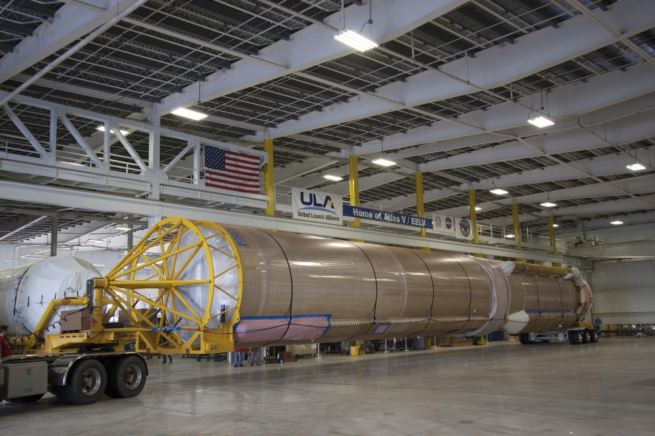 CAPE CANAVERAL, Fla. – The United Launch Alliance Atlas V launch vehicle that will boost the Tracking and Data Relay Satellite, or TDRS-L, spacecraft into orbit arrives at the Atlas Spaceflight Operations Center on Cape Canaveral Air Force Station for checkout in preparation for launch. TDRS-L is the second of three next-generation satellites designed to ensure vital operational continuity for the NASA Space Network. It is scheduled to launch from Cape Canaveral's Space Launch Complex 41 atop an Atlas V rocket in January 2014. The current Tracking and Data Relay Satellite system consists of eight in-orbit satellites distributed to provide near continuous information relay service to missions such as the Hubble Space Telescope and International Space Station. For more information, visit: http://www.nasa.gov/content/tracking-and-data-relay-satellite-tdrs/ Photo credit: NASA/ Jim Grossman