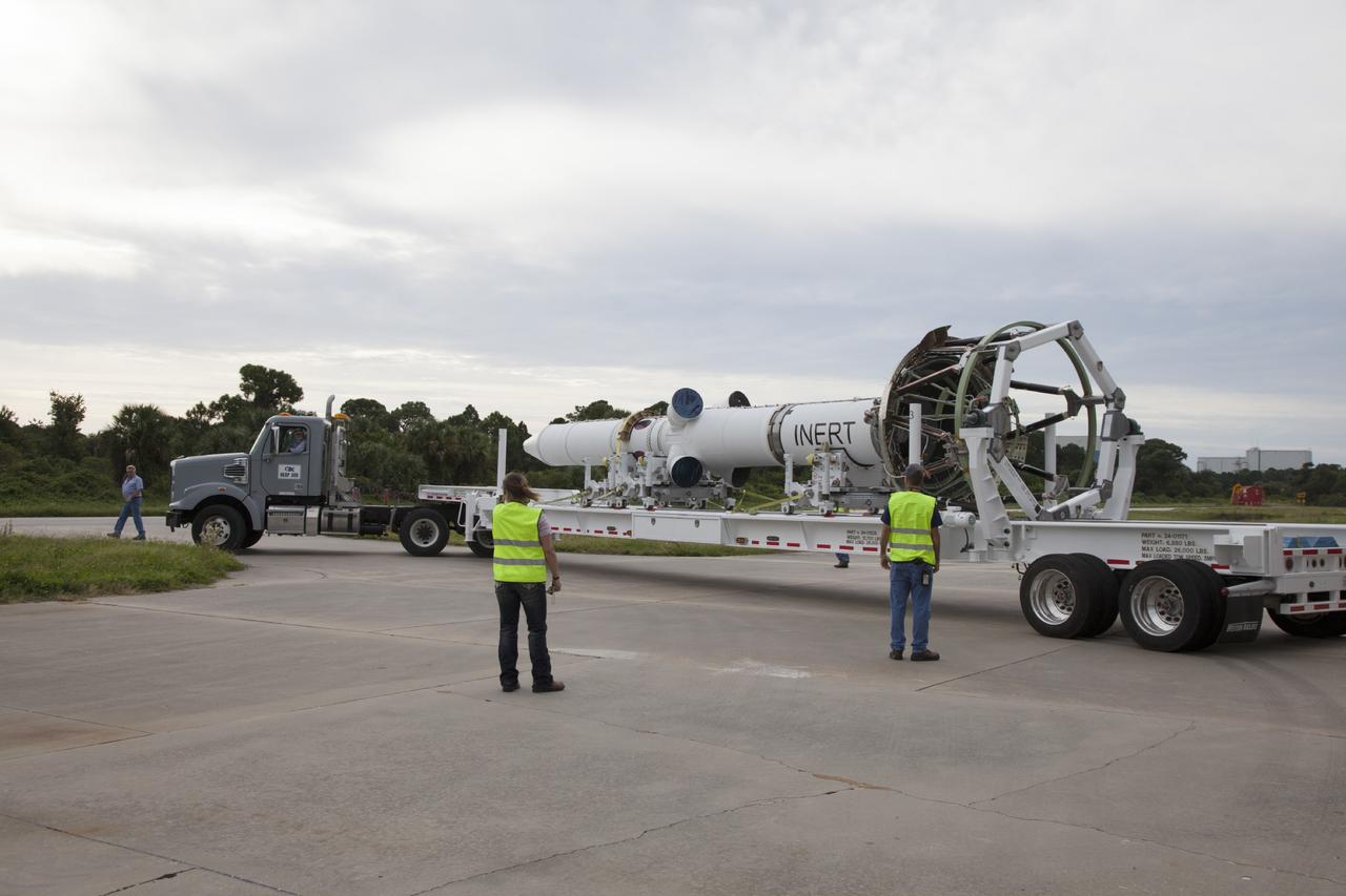 CAPE CANAVERAL, Fla. – At the Launch Abort System Facility at NASA’s Kennedy Space Center in Florida, the launch abort system, or LAS, for the Orion Exploration Flight Test-1, is being moved by flatbed truck from the high bay. The LAS will be moved to a low bay at the facility to complete processing. Orion is the exploration spacecraft designed to carry crews to space beyond low Earth orbit. It will provide emergency abort capability, sustain the crew during the space travel and provide safe re-entry from deep space return velocities. The LAS is designed to safely pull the Orion crew module away from the launch vehicle in the event of an emergency on the launch pad or during the initial ascent of NASA’s Space Launch System, or SLS, rocket. Orion’s first unpiloted test flight is scheduled to launch in 2014 atop a Delta IV rocket. A second uncrewed flight test is scheduled for 2017 on the SLS rocket. For more information, visit http://www.nasa.gov/orion. Photo credit: NASA/Daniel Casper