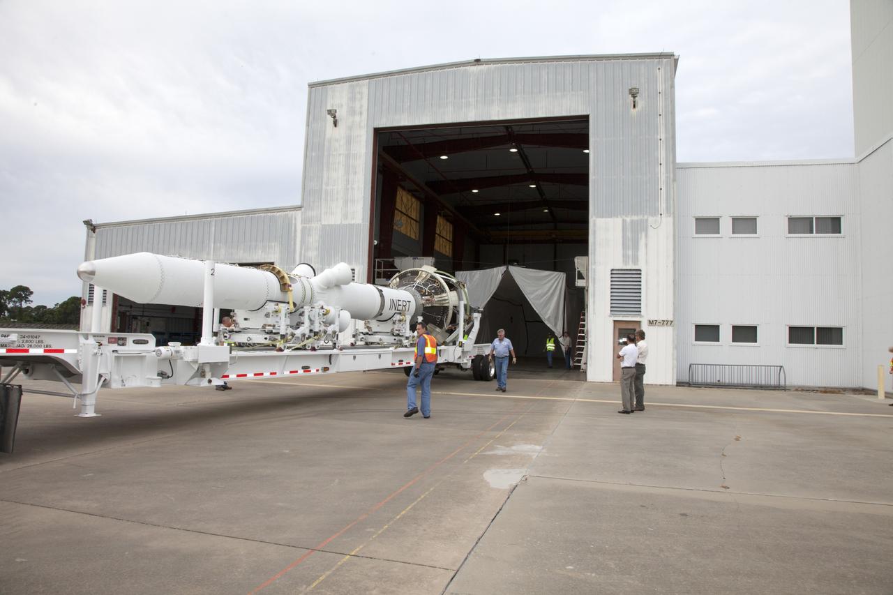 CAPE CANAVERAL, Fla. – At the Launch Abort System Facility at NASA’s Kennedy Space Center in Florida, the launch abort system, or LAS, for the Orion Exploration Flight Test-1, is backed by flatbed truck into a low bay at the facility. The low bay has been prepared for additional LAS processing. Orion is the exploration spacecraft designed to carry crews to space beyond low Earth orbit. It will provide emergency abort capability, sustain the crew during the space travel and provide safe re-entry from deep space return velocities. The LAS is designed to safely pull the Orion crew module away from the launch vehicle in the event of an emergency on the launch pad or during the initial ascent of NASA’s Space Launch System, or SLS, rocket. Orion’s first unpiloted test flight is scheduled to launch in 2014 atop a Delta IV rocket. A second uncrewed flight test is scheduled for 2017 on the SLS rocket. For more information, visit http://www.nasa.gov/orion. Photo credit: NASA/Daniel Casper