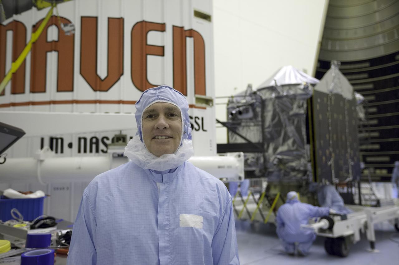 CAPE CANAVERAL, Fla. – Chuck Tatro of NASA's Launch Services Program is the Mars Atmosphere and Volatile Evolution, or MAVEN, mission manager. The MAVEN spacecraft is in the background following encapsulation in its payload fairing inside the Payload Hazardous Servicing Facility at NASA's Kennedy Space Center in Florida.      MAVEN is being prepared for its scheduled launch on Nov 18, 2013 from Cape Canaveral Air Force Station, Fla. atop a United Launch Alliance Atlas V rocket. Positioned in an orbit above the Red Planet, MAVEN will study the upper atmosphere of Mars in unprecedented detail. For more information, visit: http://www.nasa.gov/mission_pages/maven/main/index.html Photo credit: NASA/Kim Shiflett