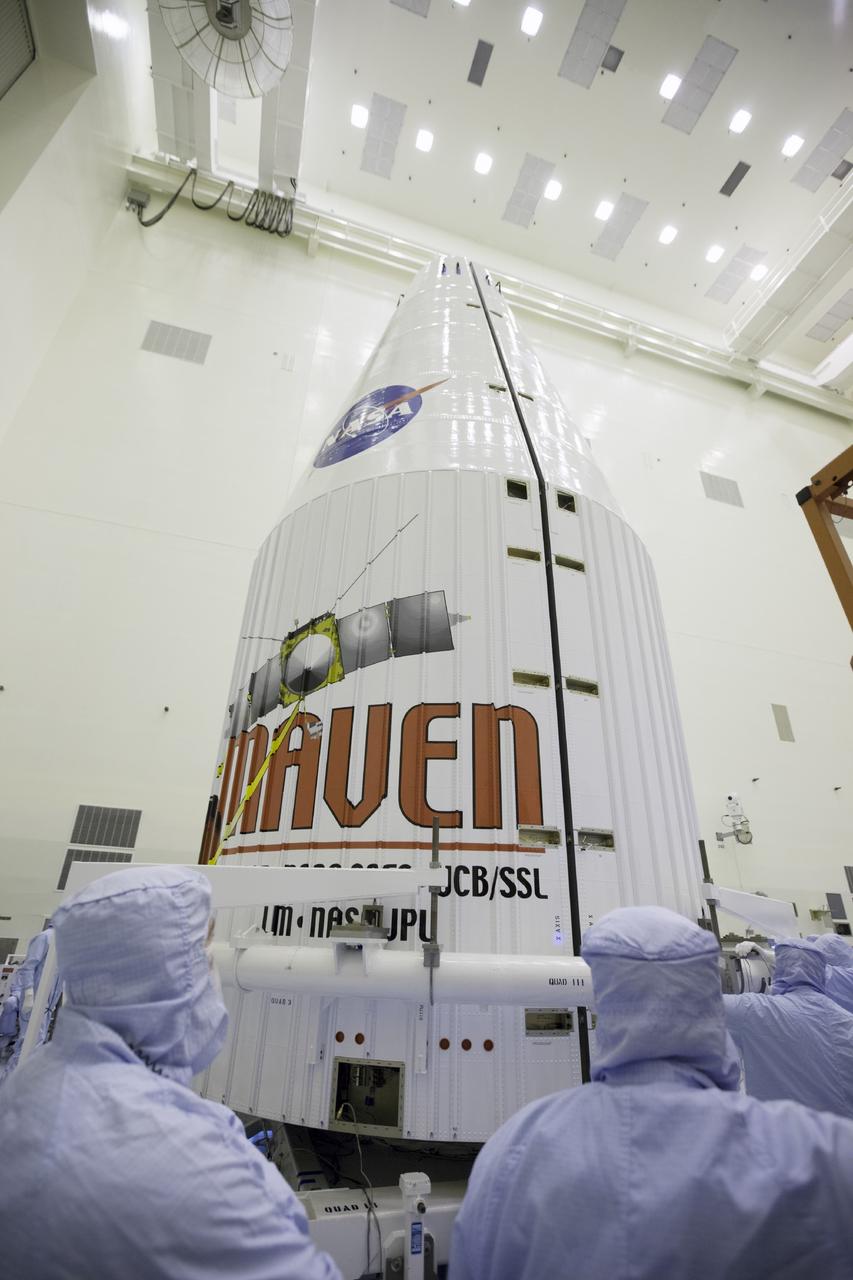 CAPE CANAVERAL, Fla. – Inside the Payload Hazardous Servicing Facility at NASA's Kennedy Space Center in Florida, engineers and technicians encapsulate the Mars Atmosphere and Volatile Evolution, or MAVEN, spacecraft inside its payload fairing.      MAVEN is being prepared for its scheduled launch on Nov 18, 2013 from Cape Canaveral Air Force Station, Fla. atop a United Launch Alliance Atlas V rocket. Positioned in an orbit above the Red Planet, MAVEN will study the upper atmosphere of Mars in unprecedented detail. For more information, visit: http://www.nasa.gov/mission_pages/maven/main/index.html Photo credit: NASA/Kim Shiflett