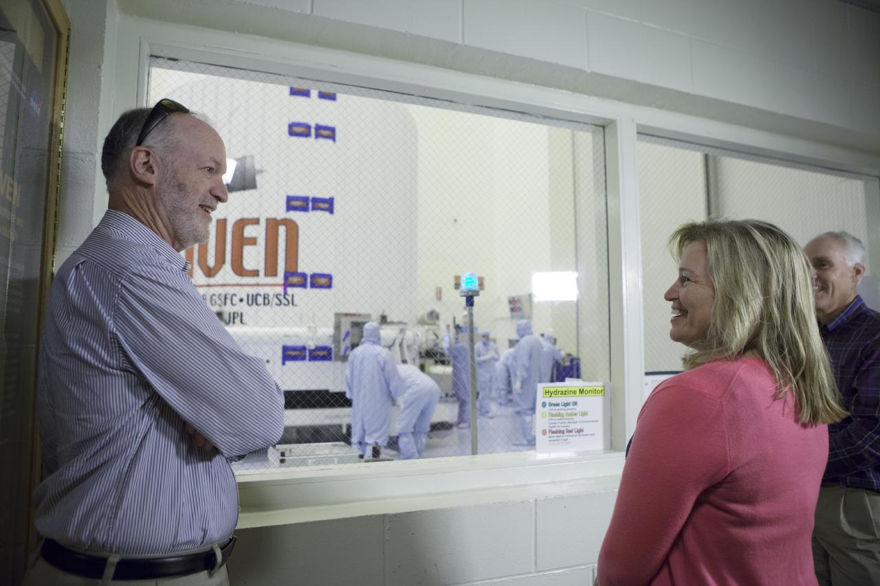 CAPE CANAVERAL, Fla. – Inside the Payload Hazardous Servicing Facility at NASA's Kennedy Space Center in Florida, Dr. Ellen Stofan, NASA's chief scientist, talks with Bruck Jakosky, left, of the University of Colorado’s Laboratory for Atmospheric and Space Physics. He is the principal investigator for the Mars Atmosphere and Volatile Evolution, or MAVEN, mission. On the right is Chuck Tatro of NASA's Launch Services Program who is the MAVEN mission manager. The MAVEN spacecraft can be seen through the window following encapsulation in its payload fairing.      MAVEN is being prepared for its scheduled launch on Nov 18, 2013 from Cape Canaveral Air Force Station, Fla. atop a United Launch Alliance Atlas V rocket. Positioned in an orbit above the Red Planet, MAVEN will study the upper atmosphere of Mars in unprecedented detail. For more information, visit: http://www.nasa.gov/mission_pages/maven/main/index.html Photo credit: NASA/Kim Shiflett