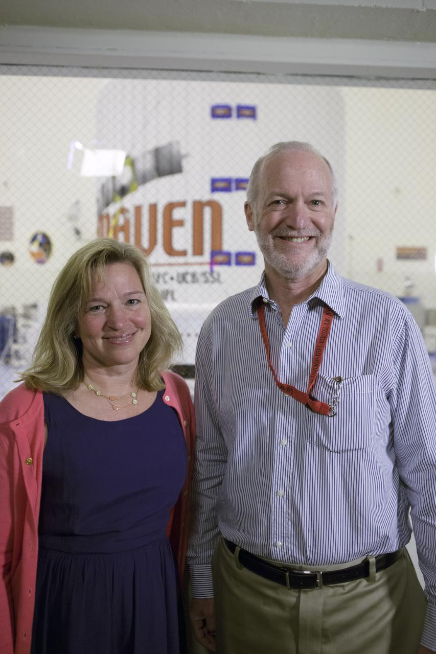 CAPE CANAVERAL, Fla. – Inside the Payload Hazardous Servicing Facility at NASA's Kennedy Space Center in Florida, Dr. Ellen Stofan, NASA's chief scientist, poses with Bruck Jakosky of the University of Colorado’s Laboratory for Atmospheric and Space Physics. He is the principal investigator for the Mars Atmosphere and Volatile Evolution, or MAVEN, mission. The MAVEN spacecraft can be seen through the window following encapsulation in its payload fairing.      MAVEN is being prepared for its scheduled launch on Nov 18, 2013 from Cape Canaveral Air Force Station, Fla. atop a United Launch Alliance Atlas V rocket. Positioned in an orbit above the Red Planet, MAVEN will study the upper atmosphere of Mars in unprecedented detail. For more information, visit: http://www.nasa.gov/mission_pages/maven/main/index.html Photo credit: NASA/Kim Shiflett