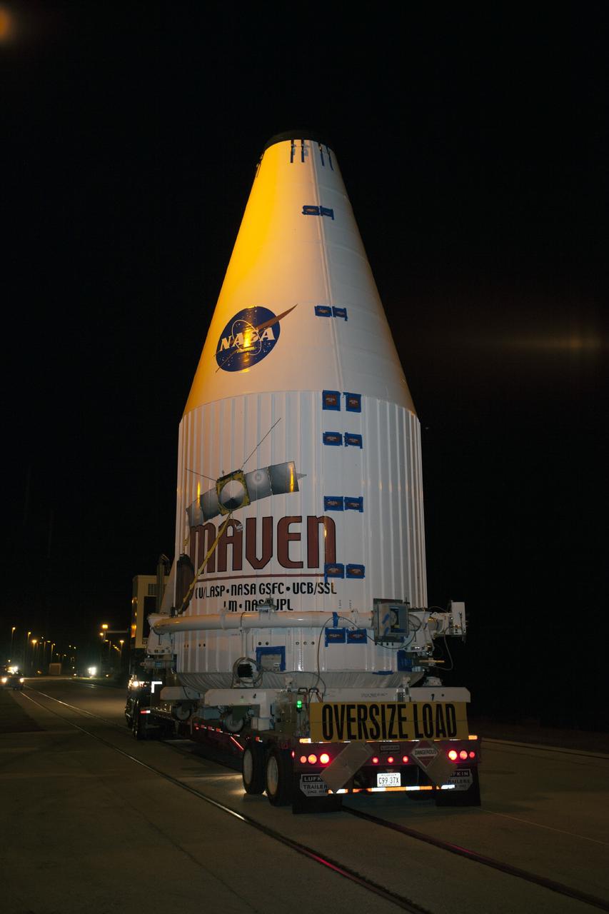 CAPE CANAVERAL, Fla. – A transporter moves NASA's MAVEN spacecraft, inside a payload fairing, to Space Launch Complex 41 where it will be hoisted atop a United Launch Alliance Atlas V rocket that will lift it into space and on to Mars. MAVEN is short for Mars Atmosphere and Volatile Evolution. Photo credit: NASA/Kim Shiflett