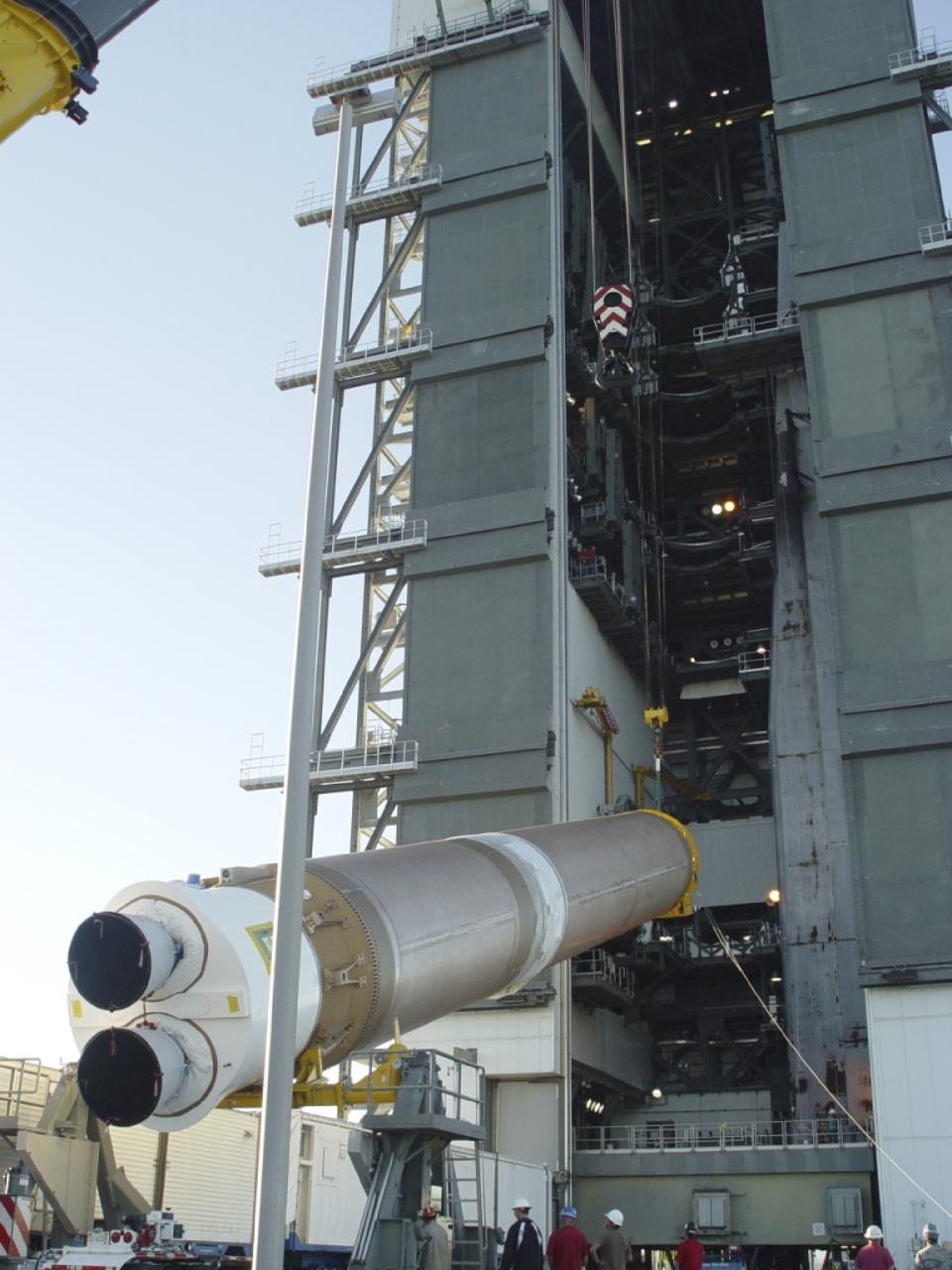 CAPE CANAVERAL, Fla. – At Cape Canaveral Air Force Station in Florida, the United Launch Alliance Atlas V first stage is lifted for stacking at Launch Pad 41 in preparation for the Mars Atmosphere and Volatile Evolution, or MAVEN, mission.      MAVEN is being prepared for its scheduled launch on Nov 18, 2013 from Cape Canaveral Air Force Station, Fla. atop a United Launch Alliance Atlas V rocket. Positioned in an orbit above the Red Planet, MAVEN will study the upper atmosphere of Mars in unprecedented detail. For more information, visit: http://www.nasa.gov/mission_pages/maven/main/index.html Photo credit: United Launch Alliance