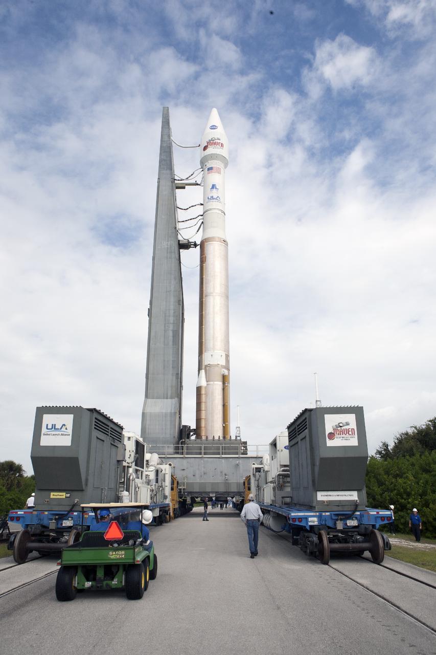 CAPE CANAVERAL, Fla. -- The United Launch Alliance Atlas V rocket carrying NASA’s Mars Atmosphere and Volatile EvolutioN, or MAVEN, spacecraft moves along the roadway from the Vertical Integration Facility to the pad at Space Launch Complex 41 on Cape Canaveral Air Force Station in Florida. Rollout began on schedule with first motion at 9:57 a.m. Launch is scheduled for Nov. 18 during a window that extends from 1:28 to 3:28 p.m. Once positioned in orbit above the Red Planet, MAVEN will study its upper atmosphere in unprecedented detail. For more information, visit: http://www.nasa.gov/mission_pages/maven/main/index.html. Photo credit: NASA/Kim Shiflett