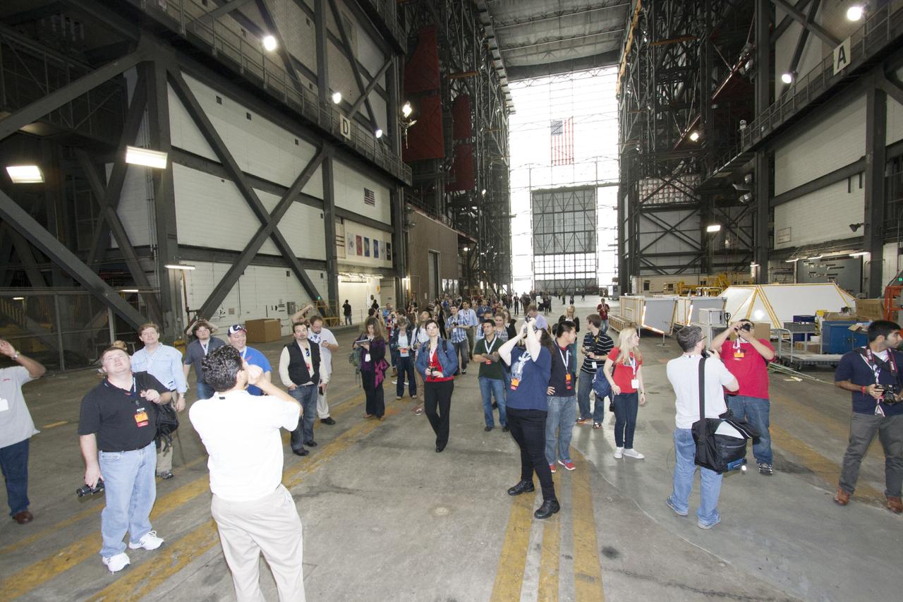 CAPE CANAVERAL, Fla. -- Social media participants are given a tour of the transfer aisle of the Vehicle Assembly Building at NASA's Kennedy Space Center in Florida. They were on hand for the upcoming launch of the Mars Atmosphere and Volatile Evolution, or MAVEN, mission.      Their visit included tours of key facilities at the Florida Spaceport and participating in presentations by key NASA leaders who updated the space agency's current efforts. Photo credit: NASA/Jim Grossman