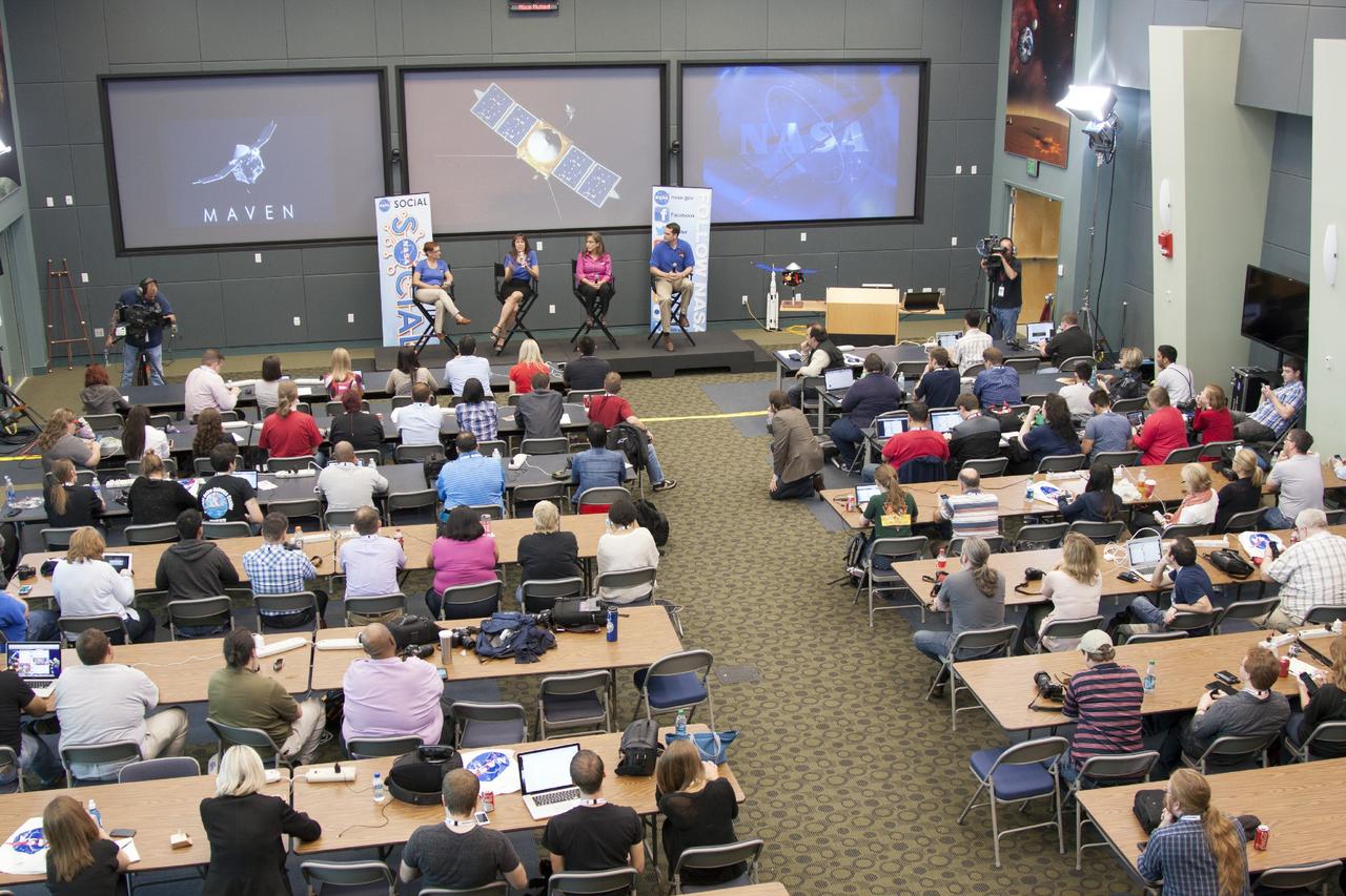 CAPE CANAVERAL, Fla. -- In the conference room of Operations Support Building II at NASA's Kennedy Space Center in Florida, social media participants listen to a briefing on the Mars Atmosphere and Volatile Evolution, or MAVEN, mission by, from the left, Lisa May, MAVEN Program executive, Kelly Fast, Mars Program scientist, Sandra Cauffman, deputy project manager at the agency's Goddard Spaceflight Center, in Greenbelt, Md., and Chris Waters, systems design team lead at Lockheed Martin.        The social media participants gathered at the Florida spaceport for the launch of the Mars Atmosphere and Volatile Evolution, or MAVEN, spacecraft. Their visit included tours of key facilities and participating in presentations by key NASA leaders who updated the space agency's current efforts. Photo credit: NASA/Jim Grossman