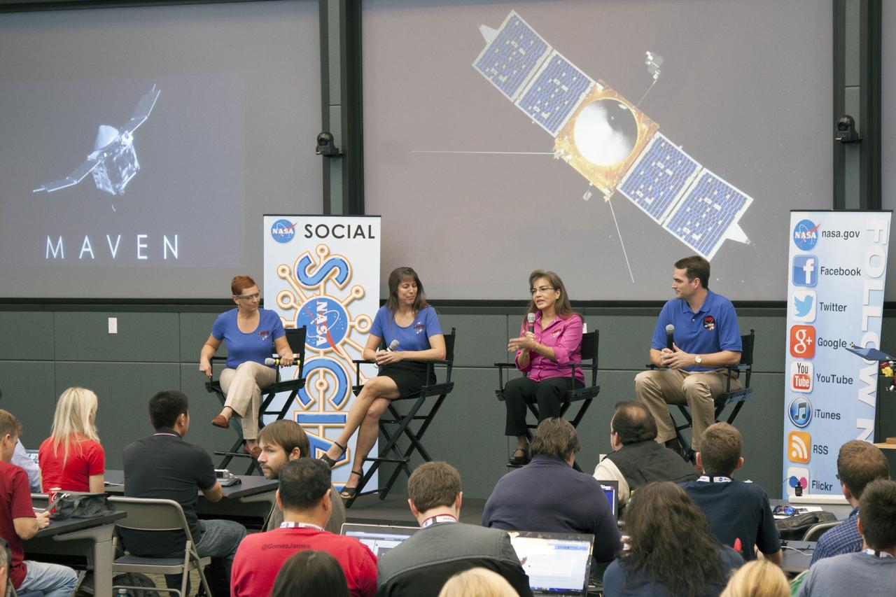 CAPE CANAVERAL, Fla. -- In the conference room of Operations Support Building II at NASA's Kennedy Space Center in Florida, social media participants listen to a briefing on the Mars Atmosphere and Volatile Evolution, or MAVEN, mission by, from the left, Lisa May, MAVEN Program executive, Kelly Fast, Mars Program scientist, Sandra Cauffman, deputy project manager at the agency's Goddard Spaceflight Center, in Greenbelt, Md., and Chris Waters, systems design team lead at Lockheed Martin.          The social media participants gathered at the Florida spaceport for the launch of the Mars Atmosphere and Volatile Evolution, or MAVEN, spacecraft. Their visit included tours of key facilities and participating in presentations by key NASA leaders who updated the space agency's current efforts. Photo credit: NASA/Jim Grossman