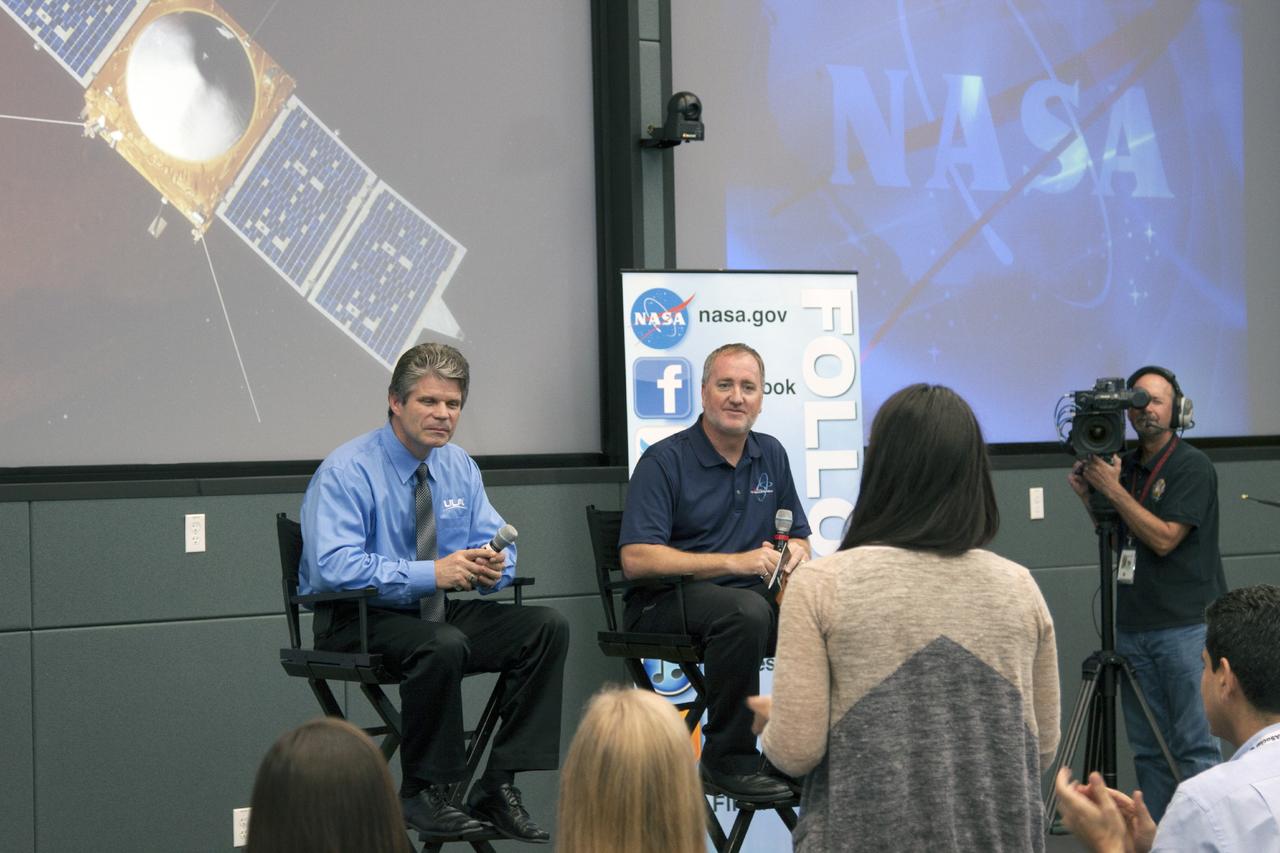 CAPE CANAVERAL, Fla. -- In the conference room of Operations Support Building II at NASA's Kennedy Space Center in Florida, social media participants listen to a briefing on the Mars Atmosphere and Volatile Evolution, or MAVEN, mission by, Joseph Fust, an engineer with United Launch Alliance, left, and Michael Wolfman, agency Vehicle System engineer.       The social media participants gathered at the Florida spaceport for the launch of the Mars Atmosphere and Volatile Evolution, or MAVEN, spacecraft. Their visit included tours of key facilities and participating in presentations by key NASA leaders who updated the space agency's current efforts. Photo credit: NASA/Jim Grossman