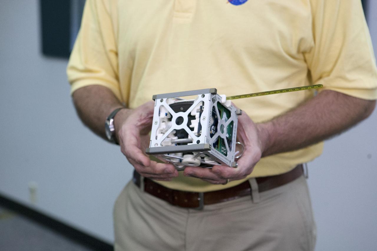 CAPE CANAVERAL, Fla. -- At the News Center at NASA's Kennedy Space Center in Florida, Andrew Petro, the agency's acting director of the Early Stage Innovation Division of the Office of the Chief Technologist, discusses the agency’s CubeSat Launch initiative. CubeSats provide opportunities for small satellite payloads to fly on rockets planned for upcoming launches.      CubeSats, a class of research spacecraft called nanosatellites, are flown as auxiliary payloads on previously planned missions. The cube-shaped satellites are approximately four inches long, have a volume of about one quart and weigh about three pounds. For more information, visit: http://www.nasa.gov/directorates/heo/home/CubeSats_initiative.html Photo credit: NASA/Kim Shiflett