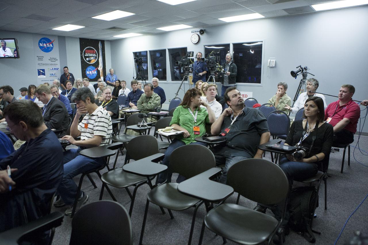 CAPE CANAVERAL, Fla. – Members of the news media ask questions during a news conference at NASA's Kennedy Space Center in Florida. Officials outlined the agency’s plans for future human spaceflight, including an expedition to Mars. The briefing took place the day prior to launch of the Mars Atmosphere and Volatile EvolutioN, or MAVEN, mission.      MAVEN is being prepared for its scheduled launch on Nov 18, 2013 from Cape Canaveral Air Force Station, Fla. atop a United Launch Alliance Atlas V rocket. Positioned in an orbit above the Red Planet, MAVEN will study the upper atmosphere of Mars in unprecedented detail. For information on the MAVEN mission, visit: http://www.nasa.gov/mission_pages/maven/main/index.html. For more on NASA Human Spaceflight, visit: http://www.spaceflight.nasa.gov/home/index.html. For information on the international Space Station, visit: http://www.nasa.gov/mission_pages/station/main/index.html Photo credit: NASA/Kim Shiflett