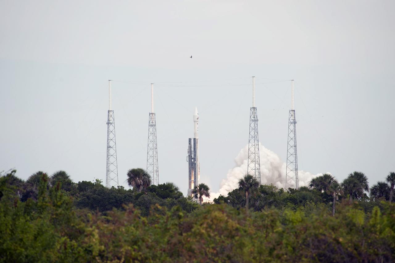 CAPE CANAVERAL, Fla. -- A United Launch Alliance Atlas V rocket lifts off Space Launch Complex 41 at Cape Canaveral Air Force Station in Florida, carrying NASA's Mars Atmosphere and Volatile EvolutioN, or MAVEN, spacecraft.    Launch was on schedule at 1:28 p.m. EST Nov. 18 at the opening of a two-hour launch window. After a 10-month journey to the Red Planet, MAVEN will study its upper atmosphere in unprecedented detail from orbit above the planet. Built by Lockheed Martin in Littleton, Colo., MAVEN will arrive at Mars in September 2014 and will be inserted into an elliptical orbit with a high point of 3,900 miles, swooping down to as close as 93 miles above the planet's surface. For more information, visit: http://www.nasa.gov/mission_pages/maven/main/index.html. Photo credit: NASA/George Roberts
