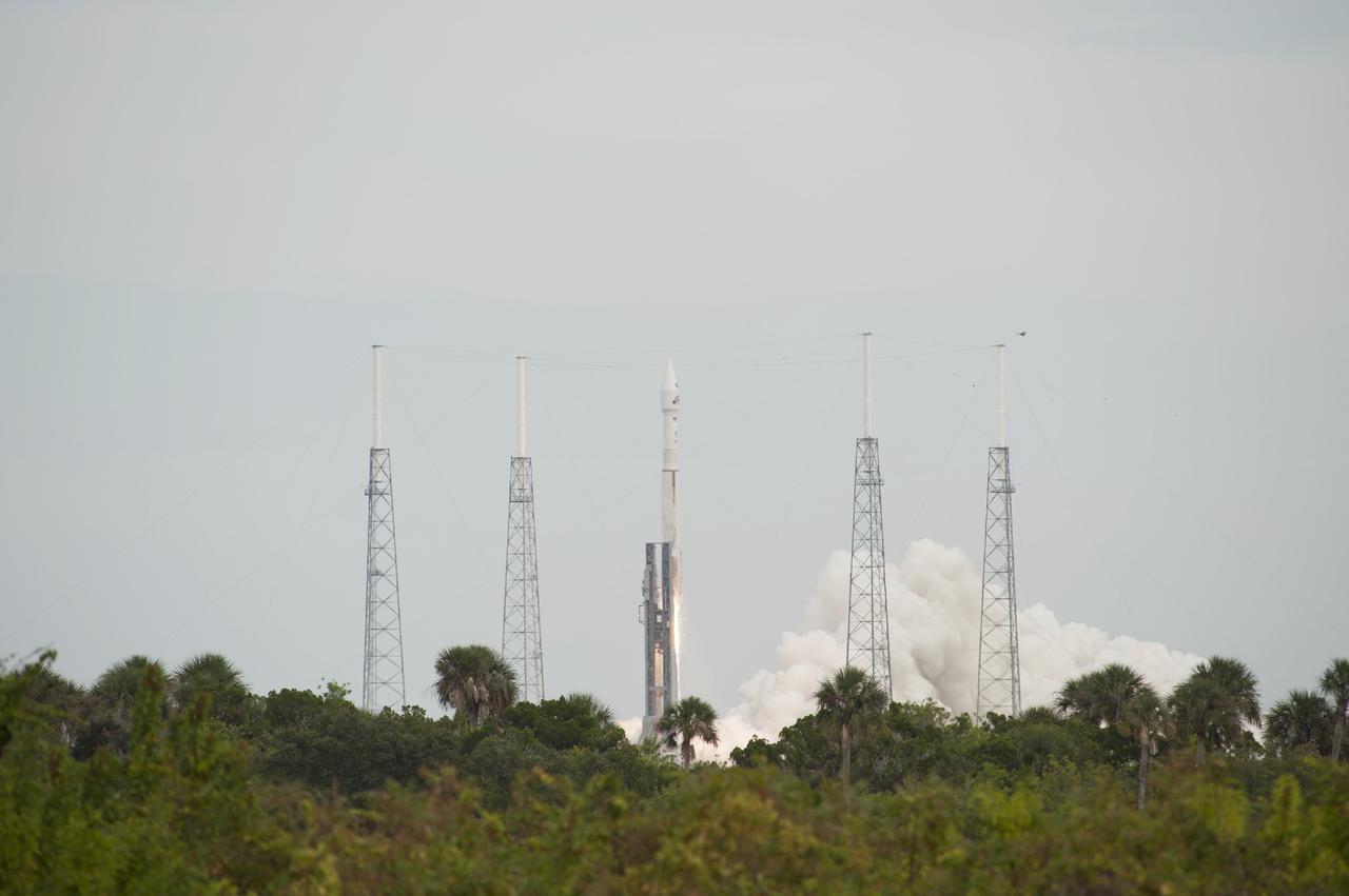 CAPE CANAVERAL, Fla. -- A United Launch Alliance Atlas V rocket lifts off Space Launch Complex 41 at Cape Canaveral Air Force Station in Florida, carrying NASA's Mars Atmosphere and Volatile EvolutioN, or MAVEN, spacecraft.    Launch was on schedule at 1:28 p.m. EST Nov. 18 at the opening of a two-hour launch window. After a 10-month journey to the Red Planet, MAVEN will study its upper atmosphere in unprecedented detail from orbit above the planet. Built by Lockheed Martin in Littleton, Colo., MAVEN will arrive at Mars in September 2014 and will be inserted into an elliptical orbit with a high point of 3,900 miles, swooping down to as close as 93 miles above the planet's surface. For more information, visit: http://www.nasa.gov/mission_pages/maven/main/index.html. Photo credit: NASA/George Roberts