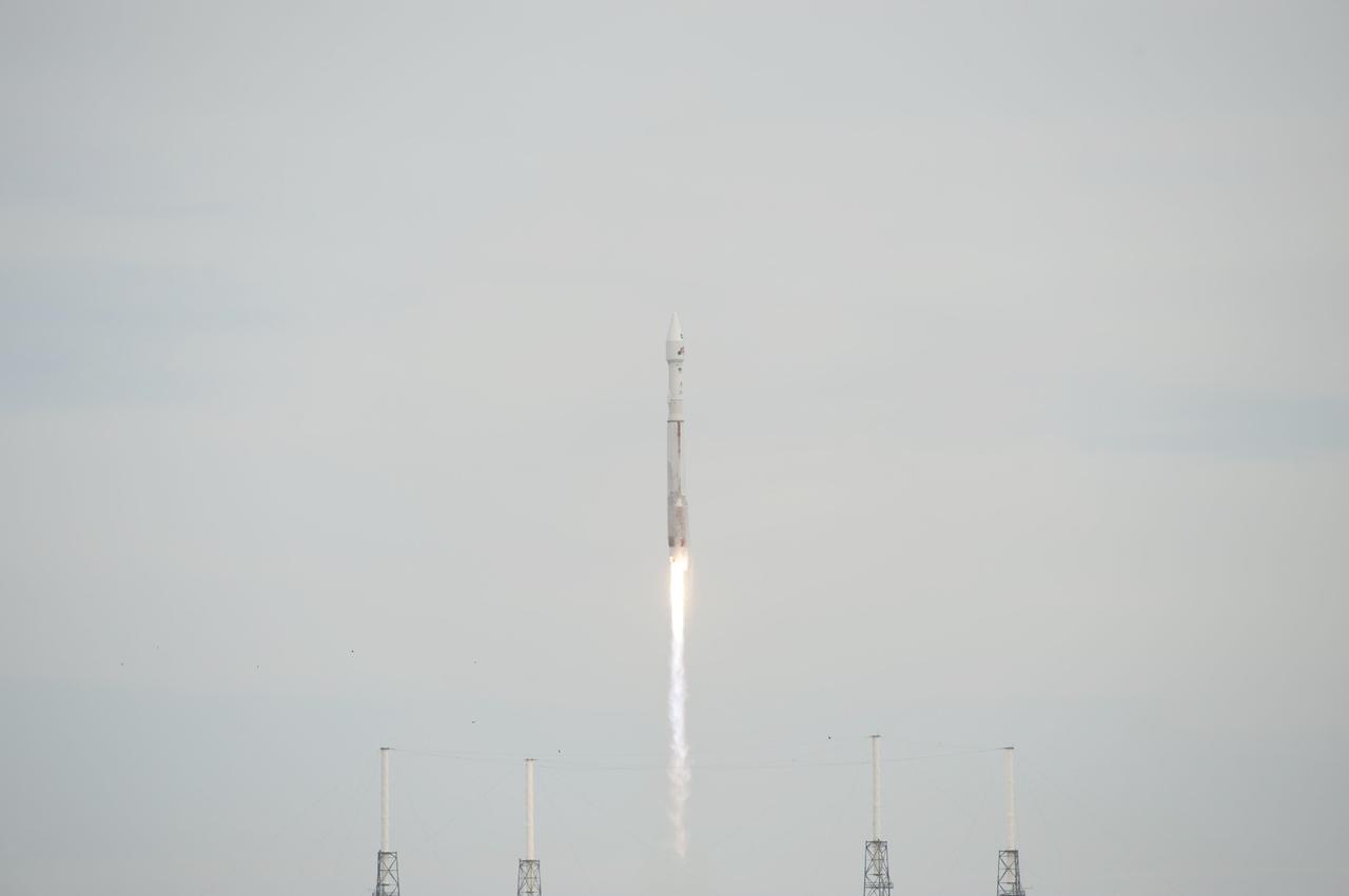 CAPE CANAVERAL, Fla. -- A United Launch Alliance Atlas V rocket lifts off through the clouds over Space Launch Complex 41 at Cape Canaveral Air Force Station in Florida, carrying NASA's Mars Atmosphere and Volatile EvolutioN, or MAVEN, spacecraft.      Launch was on schedule at 1:28 p.m. EST Nov. 18 at the opening of a two-hour launch window. After a 10-month journey to the Red Planet, MAVEN will study its upper atmosphere in unprecedented detail from orbit above the planet. Built by Lockheed Martin in Littleton, Colo., MAVEN will arrive at Mars in September 2014 and will be inserted into an elliptical orbit with a high point of 3,900 miles, swooping down to as close as 93 miles above the planet's surface. For more information, visit: http://www.nasa.gov/mission_pages/maven/main/index.html. Photo credit: NASA/George Roberts