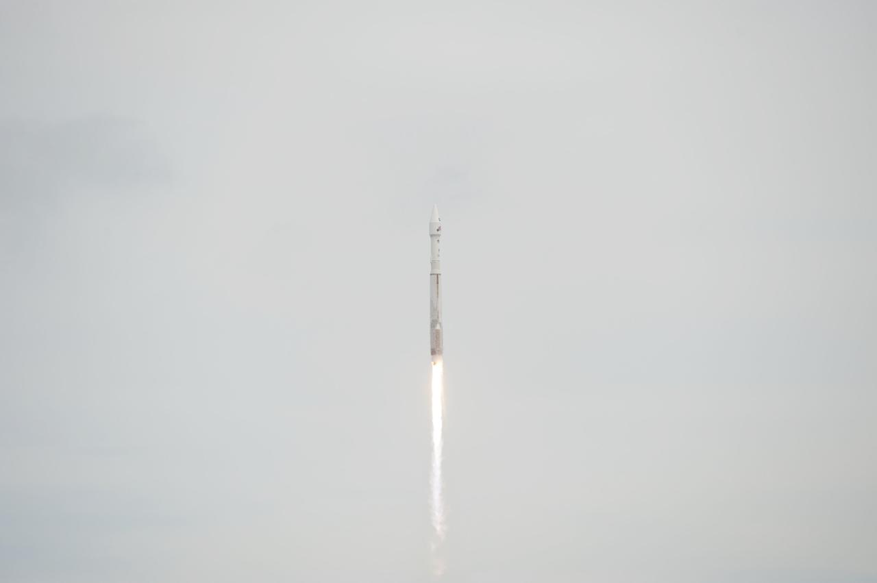 CAPE CANAVERAL, Fla. -- A United Launch Alliance Atlas V rocket lifts off through the clouds over Space Launch Complex 41 at Cape Canaveral Air Force Station in Florida, carrying NASA's Mars Atmosphere and Volatile EvolutioN, or MAVEN, spacecraft.    Launch was on schedule at 1:28 p.m. EST Nov. 18 at the opening of a two-hour launch window. After a 10-month journey to the Red Planet, MAVEN will study its upper atmosphere in unprecedented detail from orbit above the planet. Built by Lockheed Martin in Littleton, Colo., MAVEN will arrive at Mars in September 2014 and will be inserted into an elliptical orbit with a high point of 3,900 miles, swooping down to as close as 93 miles above the planet's surface. For more information, visit: http://www.nasa.gov/mission_pages/maven/main/index.html. Photo credit: NASA/George Roberts