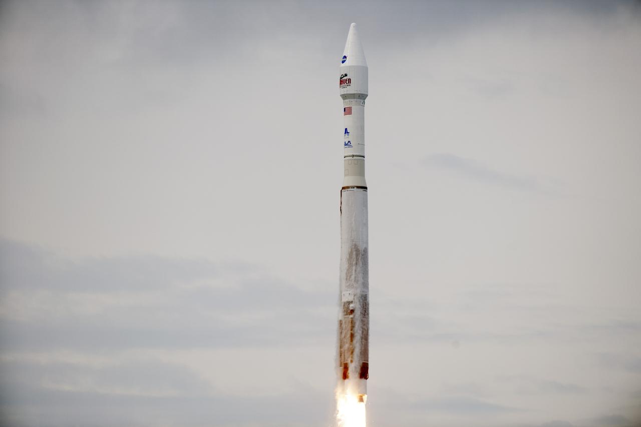 CAPE CANAVERAL, Fla. -- A United Launch Alliance Atlas V rocket lifts off through the clouds over Space Launch Complex 41 at Cape Canaveral Air Force Station in Florida, carrying NASA's Mars Atmosphere and Volatile EvolutioN, or MAVEN, spacecraft.    Launch was on schedule at 1:28 p.m. EST Nov. 18 at the opening of a two-hour launch window. After a 10-month journey to the Red Planet, MAVEN will study its upper atmosphere in unprecedented detail from orbit above the planet. Built by Lockheed Martin in Littleton, Colo., MAVEN will arrive at Mars in September 2014 and will be inserted into an elliptical orbit with a high point of 3,900 miles, swooping down to as close as 93 miles above the planet's surface. For more information, visit: http://www.nasa.gov/mission_pages/maven/main/index.html. Photo credit: NASA/Rusty Backer
