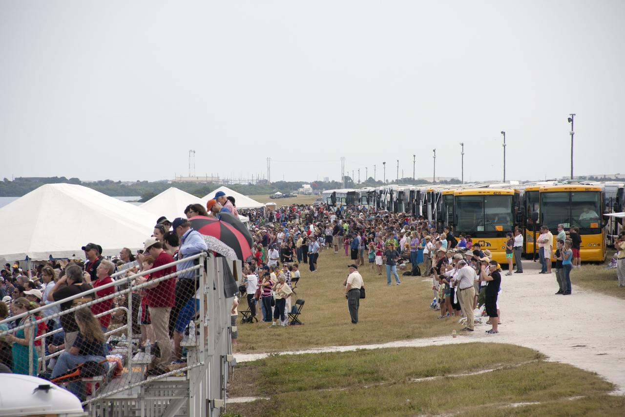 CAPE CANAVERAL, Fla. -- Invited guests watch the launch of NASA’s Mars Atmosphere and Volatile EvolutioN, or MAVEN, spacecraft from the NASA Causeway between NASA's Kennedy Space Center and Cape Canaveral Air Force Station in Florida.      Launch was on schedule at 1:28 p.m. EST Nov. 18 at the opening of a two-hour launch window. After a 10-month journey to the Red Planet, MAVEN will study its upper atmosphere in unprecedented detail from orbit above the planet. Built by Lockheed Martin in Littleton, Colo., MAVEN will arrive at Mars in September 2014 and will be inserted into an elliptical orbit with a high point of 3,900 miles, swooping down to as close as 93 miles above the planet's surface. For more information, visit: http://www.nasa.gov/mission_pages/maven/main/index.html. Photo credit: NASA/Jim Grossmann