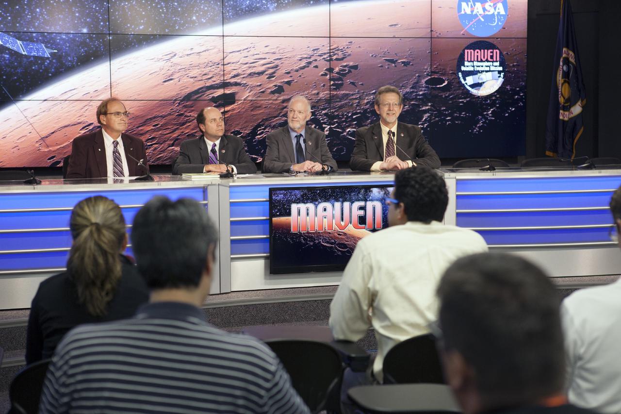 CAPE CANAVERAL, Fla. -- A post-launch news conference is held in NASA's Press Site TV auditorium following the successful launch of NASA’s Mars Atmosphere and Volatile EvolutioN, or MAVEN, spacecraft. Participating from left are moderator George Diller, NASA Public Affairs, David Mitchell, NASA MAVEN project manager at the Goddard Space Flight Center in Greenbelt, Md., Bruce Jakosky, MAVEN principal investigator from the Laboratory for Atmospheric and Space Physics at the University of Colorado at Boulder, and Dr. Jim Green, director of the Planetary Science Division at NASA Headquarters.    Launch was on schedule at 1:28 p.m. EST Nov. 18 at the opening of a two-hour launch window. After a 10-month journey to the Red Planet, MAVEN will study its upper atmosphere in unprecedented detail from orbit above the planet. Built by Lockheed Martin in Littleton, Colo., MAVEN will arrive at Mars in September 2014 and will be inserted into an elliptical orbit with a high point of 3,900 miles, swooping down to as close as 93 miles above the planet's surface. For more information, visit: http://www.nasa.gov/mission_pages/maven/main/index.html. Photo credit: NASA/Kim Shiflett