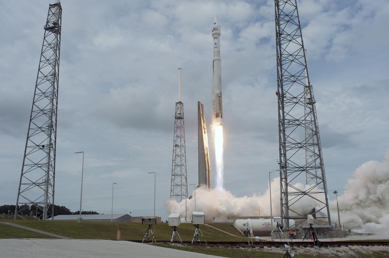 CAPE CANAVERAL, Fla. -- The United Launch Alliance Atlas V rocket carrying NASA's Mars Atmosphere and Volatile EvolutioN, or MAVEN, spacecraft soars off Space Launch Complex 41 at Cape Canaveral Air Force Station in Florida. Launch was on schedule at 1:28 p.m. EST Nov. 18 at the opening of a two-hour launch window. After a 10-month journey to the Red Planet, MAVEN will study its upper atmosphere in unprecedented detail from orbit above the planet. Built by Lockheed Martin in Littleton, Colo., MAVEN will arrive at Mars in September 2014 and will be inserted into an elliptical orbit with a high point of 3,900 miles, swooping down to as close as 93 miles above the planet's surface. For more information, visit: http://www.nasa.gov/mission_pages/maven/main/index.html. Photo credit: NASA/Tony Gray and Rick Wetherington