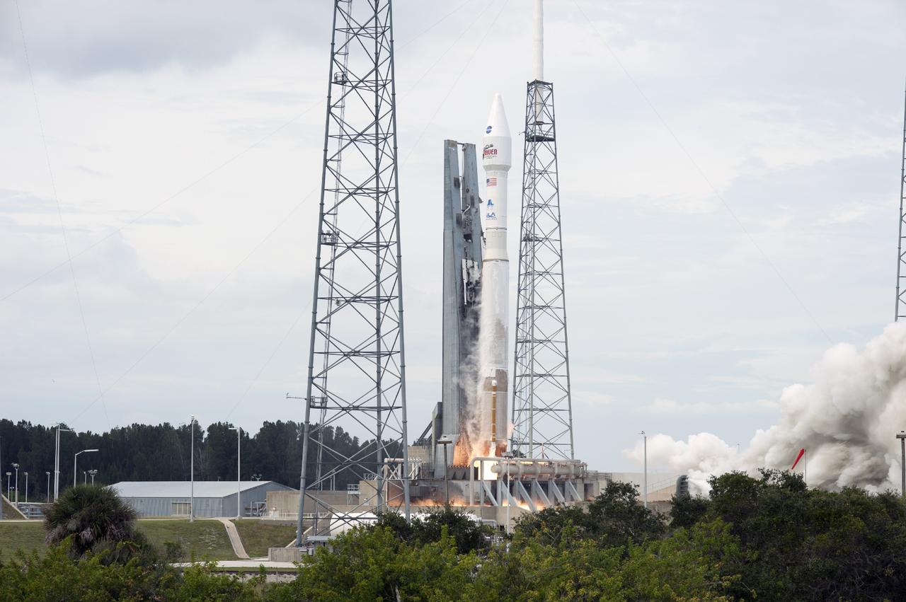 CAPE CANAVERAL, Fla. -- The exhaust plume builds at Space Launch Complex 41 on Cape Canaveral Air Force Station in Florida as the engine ignites under the United Launch Alliance Atlas V rocket carrying NASA's Mars Atmosphere and Volatile EvolutioN, or MAVEN, spacecraft into orbit. Launch was on schedule at 1:28 p.m. EST Nov. 18 at the opening of a two-hour launch window. After a 10-month journey to the Red Planet, MAVEN will study its upper atmosphere in unprecedented detail from orbit above the planet. Built by Lockheed Martin in Littleton, Colo., MAVEN will arrive at Mars in September 2014 and will be inserted into an elliptical orbit with a high point of 3,900 miles, swooping down to as close as 93 miles above the planet's surface. For more information, visit: http://www.nasa.gov/mission_pages/maven/main/index.html. Photo credit: NASA/Tony Gray and Rick Wetherington