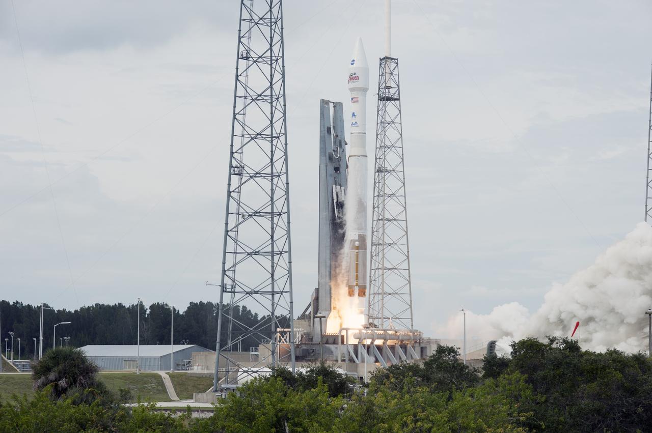 CAPE CANAVERAL, Fla. -- The exhaust plume builds at Space Launch Complex 41 on Cape Canaveral Air Force Station in Florida as the engine ignites under the United Launch Alliance Atlas V rocket carrying NASA's Mars Atmosphere and Volatile EvolutioN, or MAVEN, spacecraft into orbit. Launch was on schedule at 1:28 p.m. EST Nov. 18 at the opening of a two-hour launch window. After a 10-month journey to the Red Planet, MAVEN will study its upper atmosphere in unprecedented detail from orbit above the planet. Built by Lockheed Martin in Littleton, Colo., MAVEN will arrive at Mars in September 2014 and will be inserted into an elliptical orbit with a high point of 3,900 miles, swooping down to as close as 93 miles above the planet's surface. For more information, visit: http://www.nasa.gov/mission_pages/maven/main/index.html. Photo credit: NASA/Tony Gray and Rick Wetherington
