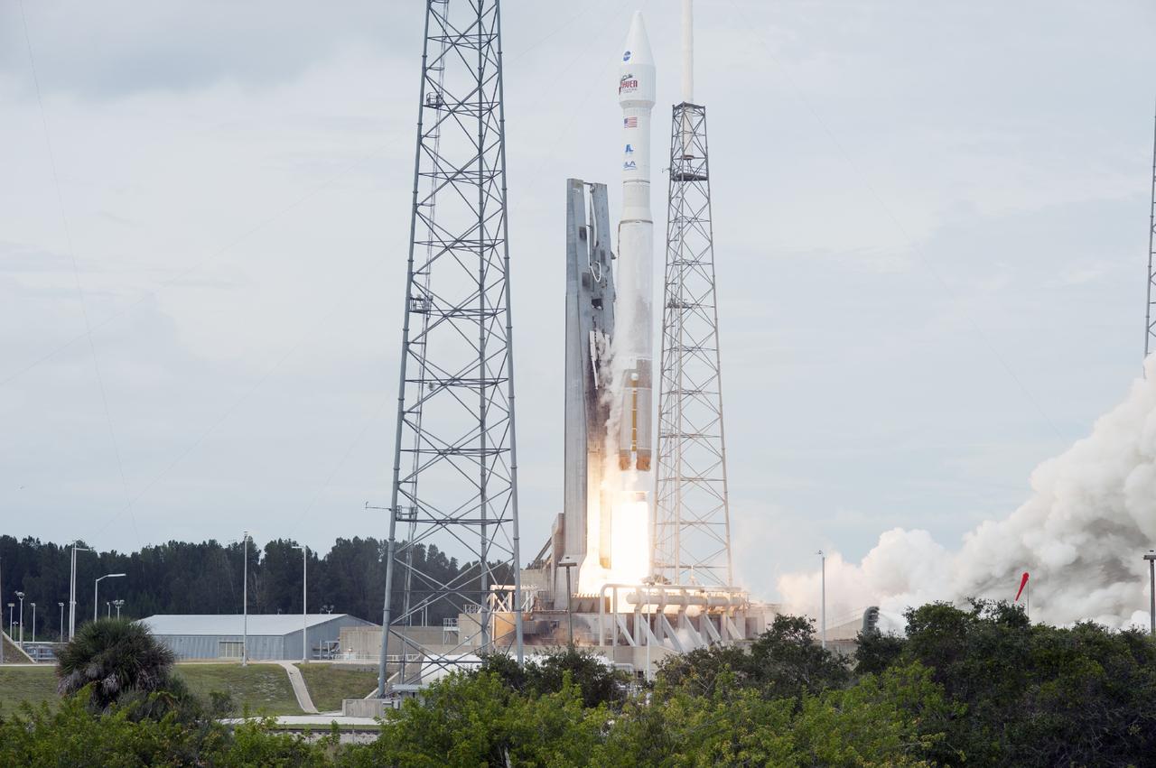 CAPE CANAVERAL, Fla. -- The United Launch Alliance Atlas V rocket carrying NASA's Mars Atmosphere and Volatile EvolutioN, or MAVEN, spacecraft rises off Space Launch Complex 41 at Cape Canaveral Air Force Station in Florida. Launch was on schedule at 1:28 p.m. EST Nov. 18 at the opening of a two-hour launch window. After a 10-month journey to the Red Planet, MAVEN will study its upper atmosphere in unprecedented detail from orbit above the planet. Built by Lockheed Martin in Littleton, Colo., MAVEN will arrive at Mars in September 2014 and will be inserted into an elliptical orbit with a high point of 3,900 miles, swooping down to as close as 93 miles above the planet's surface. For more information, visit: http://www.nasa.gov/mission_pages/maven/main/index.html. Photo credit: NASA/Tony Gray and Rick Wetherington