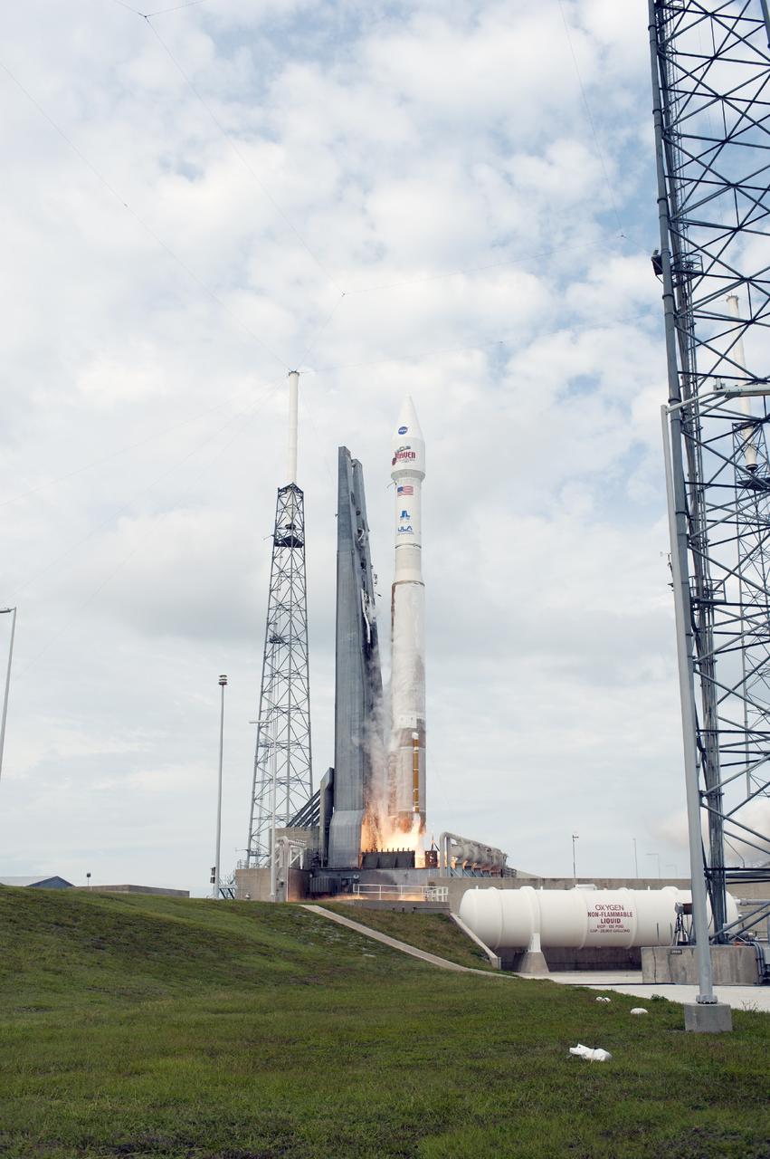CAPE CANAVERAL, Fla. -- The engine ignites under the United Launch Alliance Atlas V rocket delivering NASA's Mars Atmosphere and Volatile EvolutioN, or MAVEN, spacecraft from Space Launch Complex 41, on Cape Canaveral Air Force Station in Florida, to orbit. Launch was on schedule at 1:28 p.m. EST Nov. 18 at the opening of a two-hour launch window. After a 10-month journey to the Red Planet, MAVEN will study its upper atmosphere in unprecedented detail from orbit above the planet. Built by Lockheed Martin in Littleton, Colo., MAVEN will arrive at Mars in September 2014 and will be inserted into an elliptical orbit with a high point of 3,900 miles, swooping down to as close as 93 miles above the planet's surface. For more information, visit: http://www.nasa.gov/mission_pages/maven/main/index.html. Photo credit: NASA/Tony Gray and Rick Wetherington