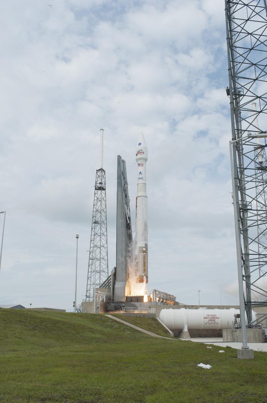 CAPE CANAVERAL, Fla. -- The engine ignites under the United Launch Alliance Atlas V rocket delivering NASA's Mars Atmosphere and Volatile EvolutioN, or MAVEN, spacecraft from Space Launch Complex 41, on Cape Canaveral Air Force Station in Florida, to orbit. Launch was on schedule at 1:28 p.m. EST Nov. 18 at the opening of a two-hour launch window. After a 10-month journey to the Red Planet, MAVEN will study its upper atmosphere in unprecedented detail from orbit above the planet. Built by Lockheed Martin in Littleton, Colo., MAVEN will arrive at Mars in September 2014 and will be inserted into an elliptical orbit with a high point of 3,900 miles, swooping down to as close as 93 miles above the planet's surface. For more information, visit: http://www.nasa.gov/mission_pages/maven/main/index.html. Photo credit: NASA/Tony Gray and Rick Wetherington