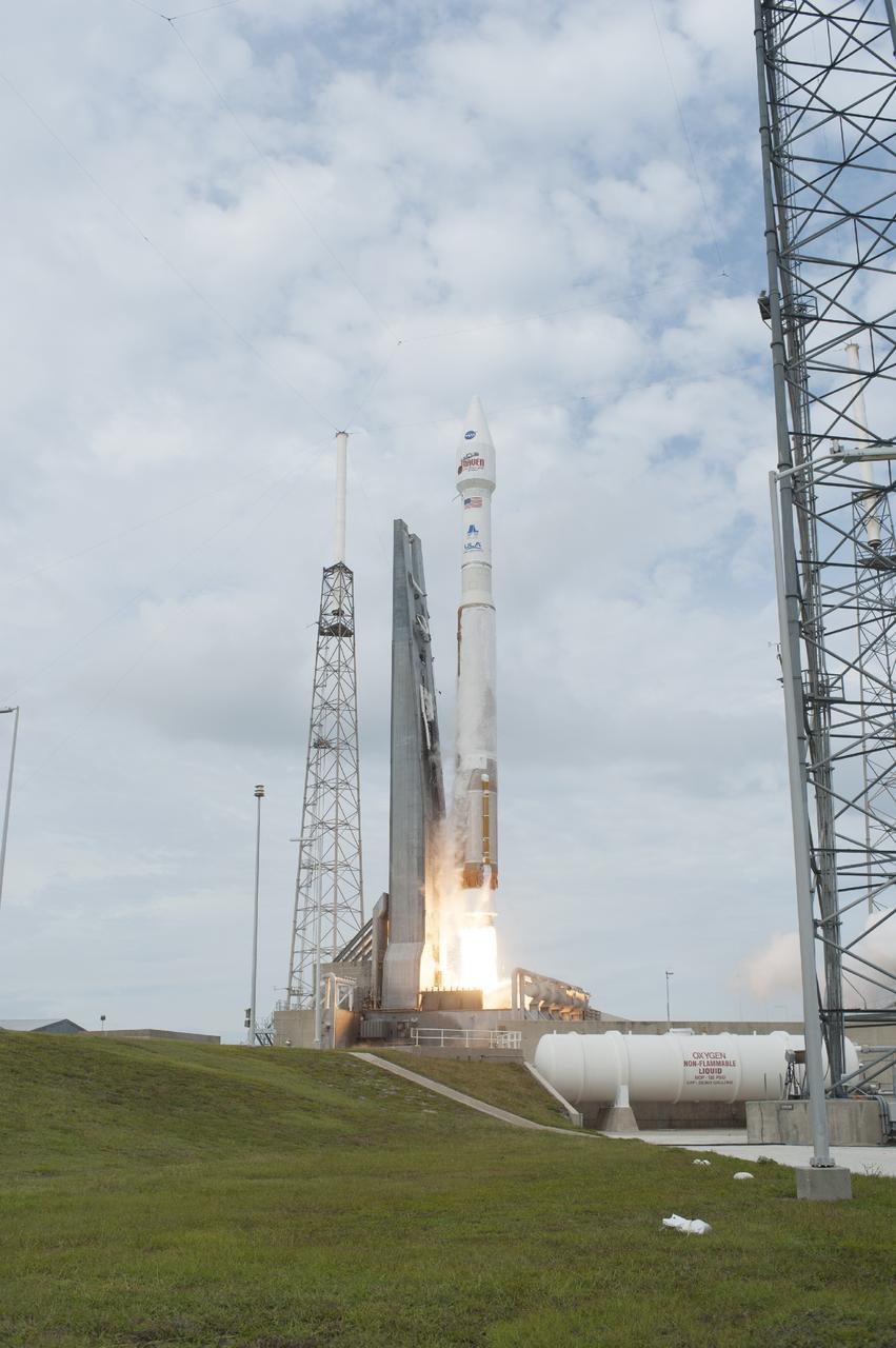 CAPE CANAVERAL, Fla. -- The engine ignites under the United Launch Alliance Atlas V rocket delivering NASA's Mars Atmosphere and Volatile EvolutioN, or MAVEN, spacecraft from Space Launch Complex 41, on Cape Canaveral Air Force Station in Florida, to orbit. Launch was on schedule at 1:28 p.m. EST Nov. 18 at the opening of a two-hour launch window. After a 10-month journey to the Red Planet, MAVEN will study its upper atmosphere in unprecedented detail from orbit above the planet. Built by Lockheed Martin in Littleton, Colo., MAVEN will arrive at Mars in September 2014 and will be inserted into an elliptical orbit with a high point of 3,900 miles, swooping down to as close as 93 miles above the planet's surface. For more information, visit: http://www.nasa.gov/mission_pages/maven/main/index.html. Photo credit: NASA/Tony Gray and Rick Wetherington