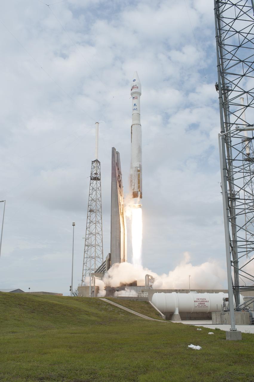 CAPE CANAVERAL, Fla. -- The United Launch Alliance Atlas V rocket carrying NASA's Mars Atmosphere and Volatile EvolutioN, or MAVEN, spacecraft lifts off Space Launch Complex 41 on Cape Canaveral Air Force Station in Florida. Launch was on schedule at 1:28 p.m. EST Nov. 18 at the opening of a two-hour launch window. After a 10-month journey to the Red Planet, MAVEN will study its upper atmosphere in unprecedented detail from orbit above the planet. Built by Lockheed Martin in Littleton, Colo., MAVEN will arrive at Mars in September 2014 and will be inserted into an elliptical orbit with a high point of 3,900 miles, swooping down to as close as 93 miles above the planet's surface. For more information, visit: http://www.nasa.gov/mission_pages/maven/main/index.html. Photo credit: NASA/Tony Gray and Rick Wetherington