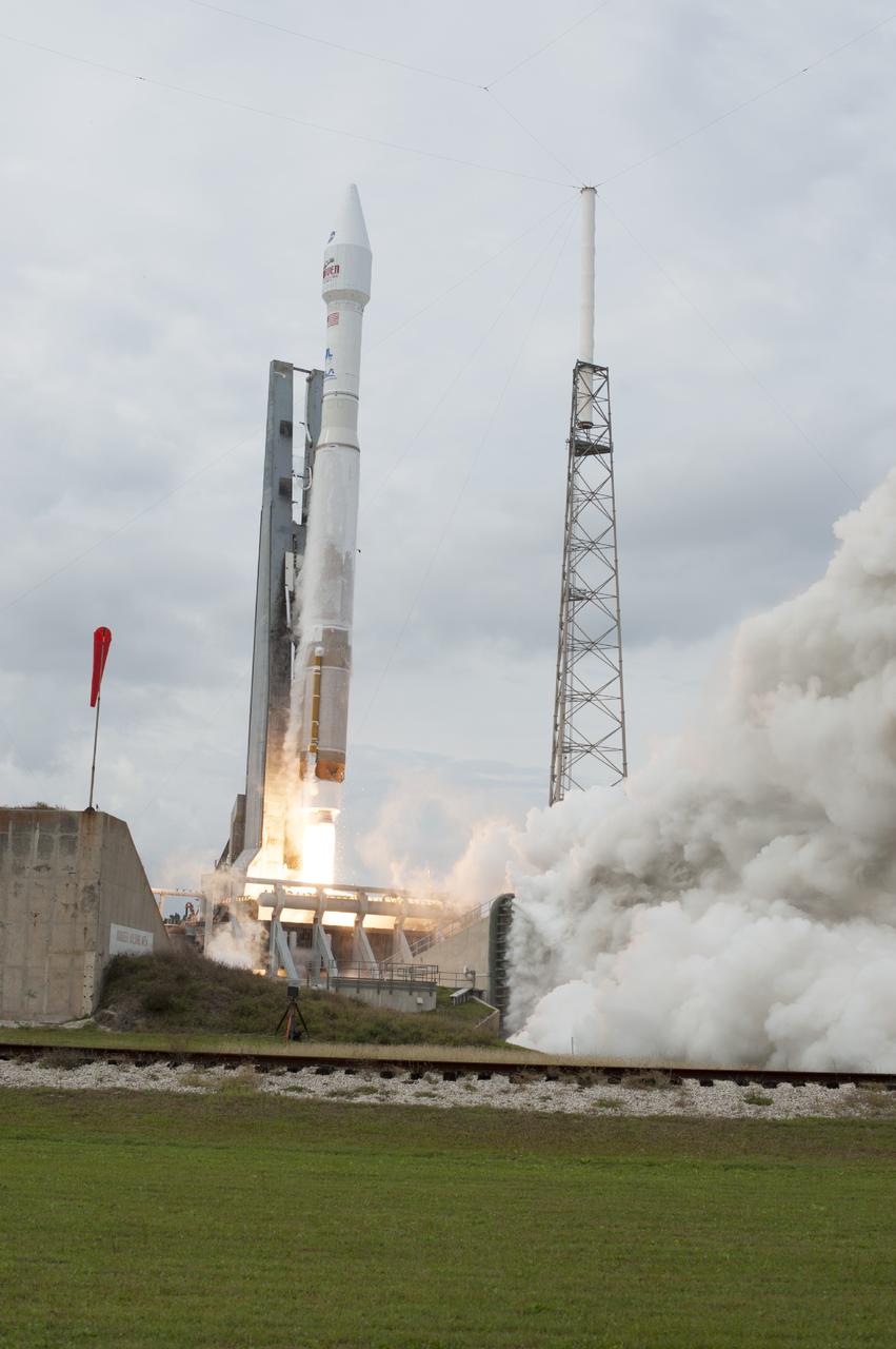 CAPE CANAVERAL, Fla. -- The exhaust plume builds at Space Launch Complex 41 on Cape Canaveral Air Force Station in Florida as the engine ignites under the United Launch Alliance Atlas V rocket carrying NASA's Mars Atmosphere and Volatile EvolutioN, or MAVEN, spacecraft to orbit. Launch was on schedule at 1:28 p.m. EST Nov. 18 at the opening of a two-hour launch window. After a 10-month journey to the Red Planet, MAVEN will study its upper atmosphere in unprecedented detail from orbit above the planet. Built by Lockheed Martin in Littleton, Colo., MAVEN will arrive at Mars in September 2014 and will be inserted into an elliptical orbit with a high point of 3,900 miles, swooping down to as close as 93 miles above the planet's surface. For more information, visit: http://www.nasa.gov/mission_pages/maven/main/index.html. Photo credit: NASA/Tony Gray and Rick Wetherington
