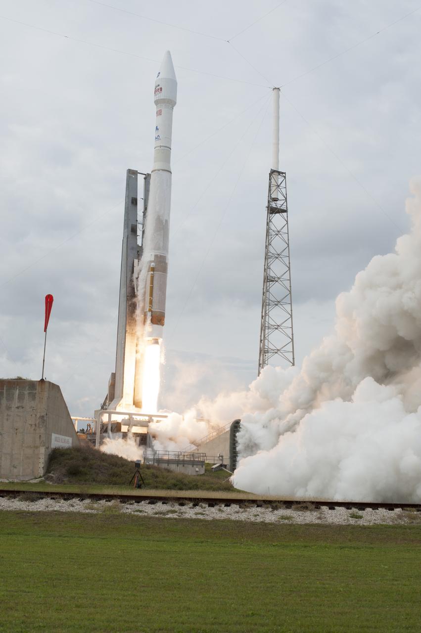 CAPE CANAVERAL, Fla. -- The United Launch Alliance Atlas V rocket carrying NASA's Mars Atmosphere and Volatile EvolutioN, or MAVEN, spacecraft rises off Space Launch Complex 41 at Cape Canaveral Air Force Station in Florida. Launch was on schedule at 1:28 p.m. EST Nov. 18 at the opening of a two-hour launch window. After a 10-month journey to the Red Planet, MAVEN will study its upper atmosphere in unprecedented detail from orbit above the planet. Built by Lockheed Martin in Littleton, Colo., MAVEN will arrive at Mars in September 2014 and will be inserted into an elliptical orbit with a high point of 3,900 miles, swooping down to as close as 93 miles above the planet's surface. For more information, visit: http://www.nasa.gov/mission_pages/maven/main/index.html. Photo credit: NASA/Tony Gray and Rick Wetherington
